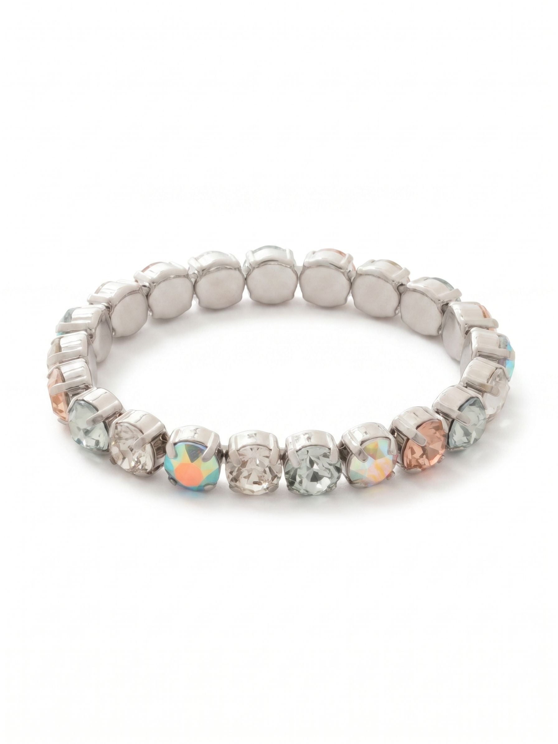 7 inch Sienna Stretch Bracelet - BFD50PDRQ - <p>An unbroken circle of color that slips easily over the hand. This stretch bracelet alternates soft blush, cool blue, and iridescent crystals that shift in tone as your wrist moves. Designed without a clasp, it rolls on effortlessly on busy mornings. The substantial round stones provide enough weight to feel significant when worn alone, yet the low profile makes it a natural addition to a layered stack.</p><ul>
<li>Alternating sequence of pastel and iridescent round crystals</li>
<li>Seamless stretch design for an unbroken line of color</li>
<li>Stretch easy slip-on design</li>
<li>Protective e-coat finish for lasting wear</li>
<li>Includes signature organza pouch for gifting and travel</li>
</ul>