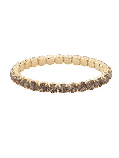 Mini Sienna Stretch Bracelet - BFD52BGASP - <p>The Mini Sienna Stretch Bracelet is a mini take on a bestselling style! The Mini Sienna Stretch Bracelet features a line of small round crystals on a sturdy jewelers' filament, stretching to fit most wrists comfortably, without the hassle of a clasp! From Sorrelli's Aspen SKY collection in our Bright Gold-tone finish.</p>