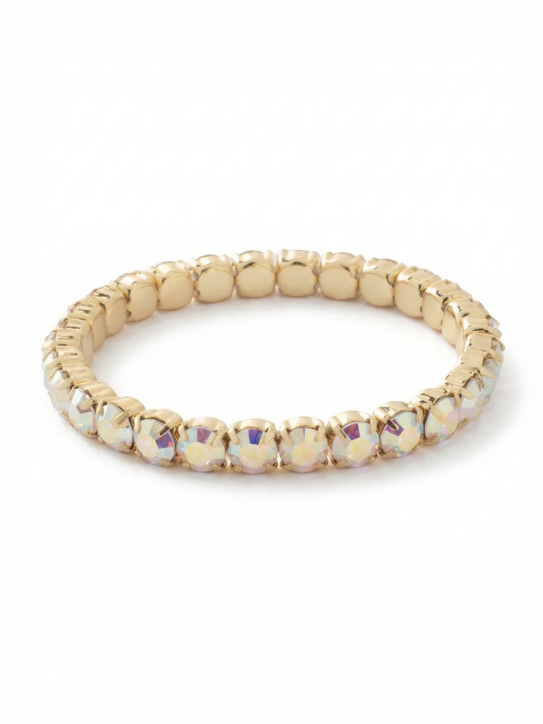 Mini Sienna Stretch Bracelet - BFD52BGCAB - <p>An unbroken line of iridescent crystals encircles the wrist, casting subtle flashes of pink and blue with every movement. The Aurora Borealis stones are securely set in bright gold-tone cups, creating a warm contrast that catches the light naturally. Designed without a clasp, the flexible stretch construction glides effortlessly over the hand and adapts easily to your daily routine. It reads as a quiet, colorful statement on its own or builds an effortless foundation for a layered stack.</p><ul>
<li>Continuous line of uniformly sized round crystals</li>
<li>Iridescent stones create shifting color variations in motion</li>
<li>Stretch easy slip-on design</li>
<li>Protective e-coat finish for lasting wear</li>
<li>Includes signature organza pouch for gifting and travel</li>
</ul>