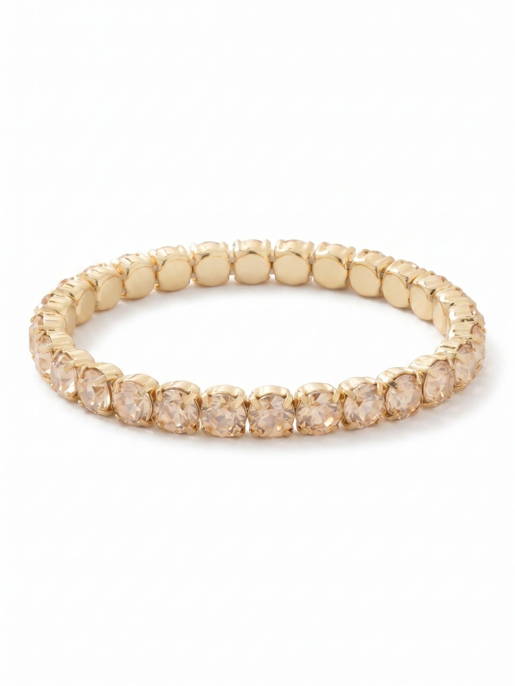 Mini Sienna Stretch Bracelet - BFD52BGDCH - <p>The Mini Sienna Stretch Bracelet is a mini take on a bestselling style! The Mini Sienna Stretch Bracelet features a line of small round crystals on a sturdy jewelers' filament, stretching to fit most wrists comfortably, without the hassle of a clasp! From Sorrelli's Dark Champagne collection in our Bright Gold-tone finish.</p>