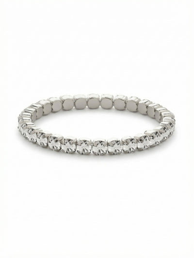 Mini Sienna Stretch Bracelet - BFD52PDCRY - <p>A seamless circle of clear round-cut crystals, this stretch bracelet brings the continuous sparkle of a classic line design without the fuss of a clasp. The hidden elasticity allows it to slip easily over your hand, settling comfortably along the wrist bone. Worn alone, the cool palladium setting frames each stone to catch the light with every gesture. It also makes an effortless foundational piece to build out a structured daily stack.</p><ul>
<li>Unbroken line of brilliant round-cut crystals</li>
<li>Concealed stretch core for a seamless circular silhouette</li>
<li>Stretch easy slip-on design</li>
<li>Protective e-coat finish for lasting wear</li>
<li>Includes signature organza pouch for gifting and travel</li>
</ul>