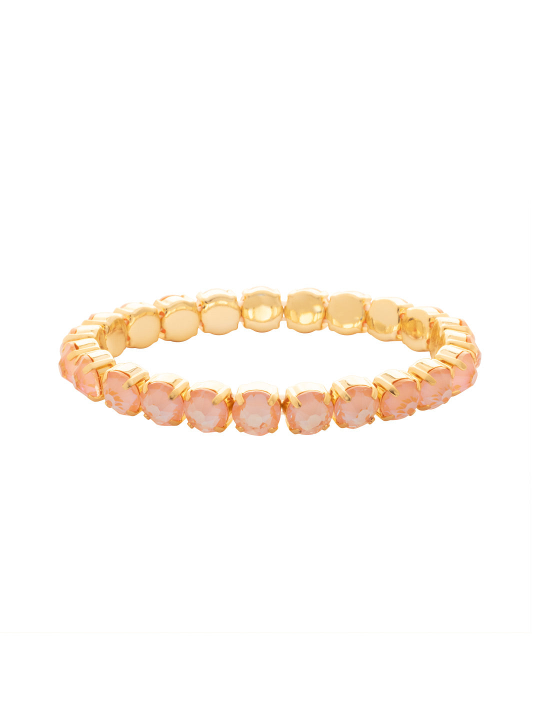 8 inch Sienna Stretch Bracelet - BFD60BGPD - <p>A modern take on a classic style, the Sienna Stretch Bracelet features a line of crystals on a sturdy jewelers' filament, stretching to fit most wrists comfortably, without the hassle of a clasp! (8 inches in diameter, fits larger wrist sizes) From Sorrelli's Peach Delite collection in our Bright Gold-tone finish.</p>