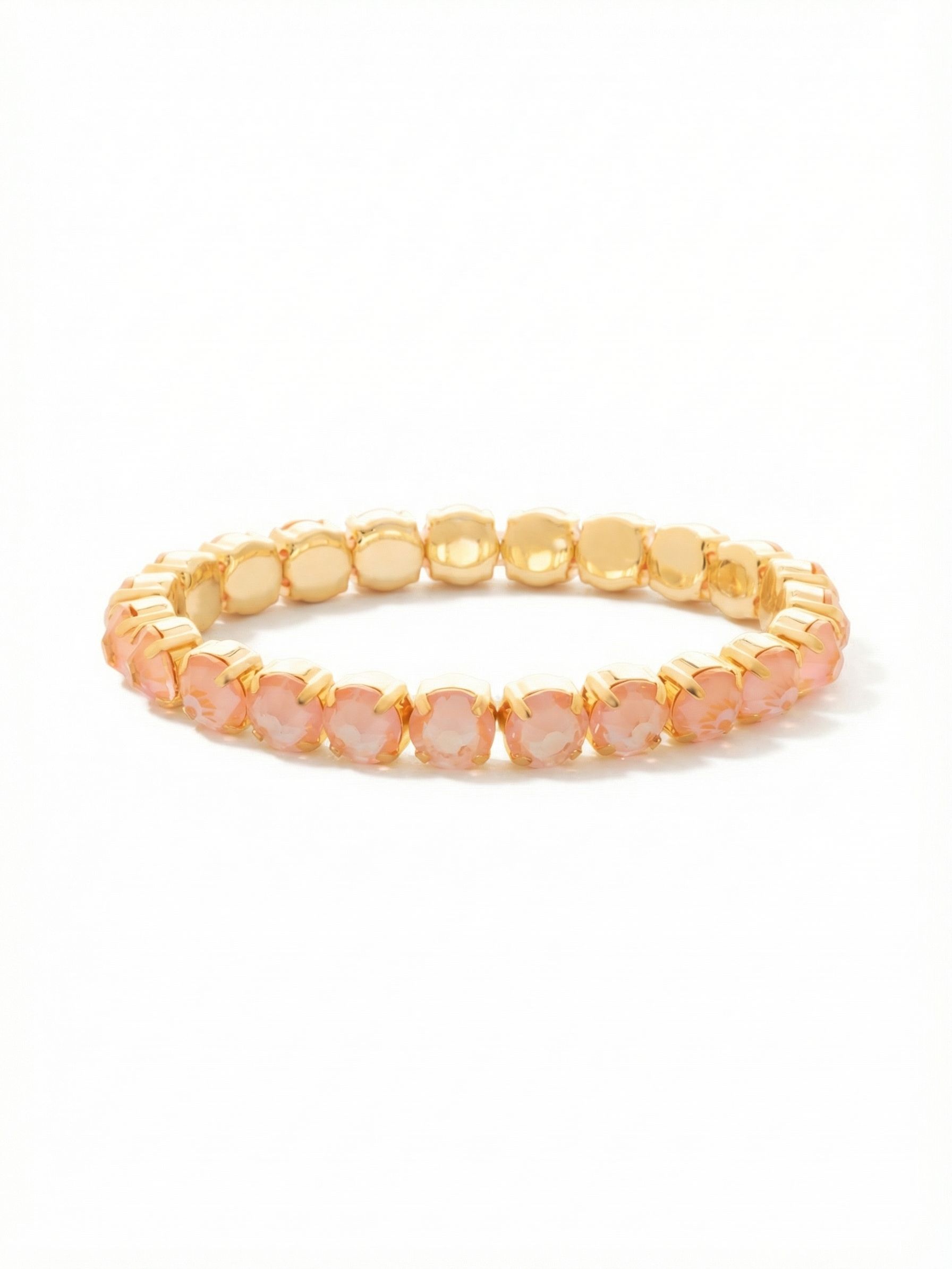 8 inch Sienna Stretch Bracelet - BFD60BGPD - <p>A modern take on a classic style, the Sienna Stretch Bracelet features a line of crystals on a sturdy jewelers' filament, stretching to fit most wrists comfortably, without the hassle of a clasp! (8 inches in diameter, fits larger wrist sizes) From Sorrelli's Peach Delite collection in our Bright Gold-tone finish.</p>