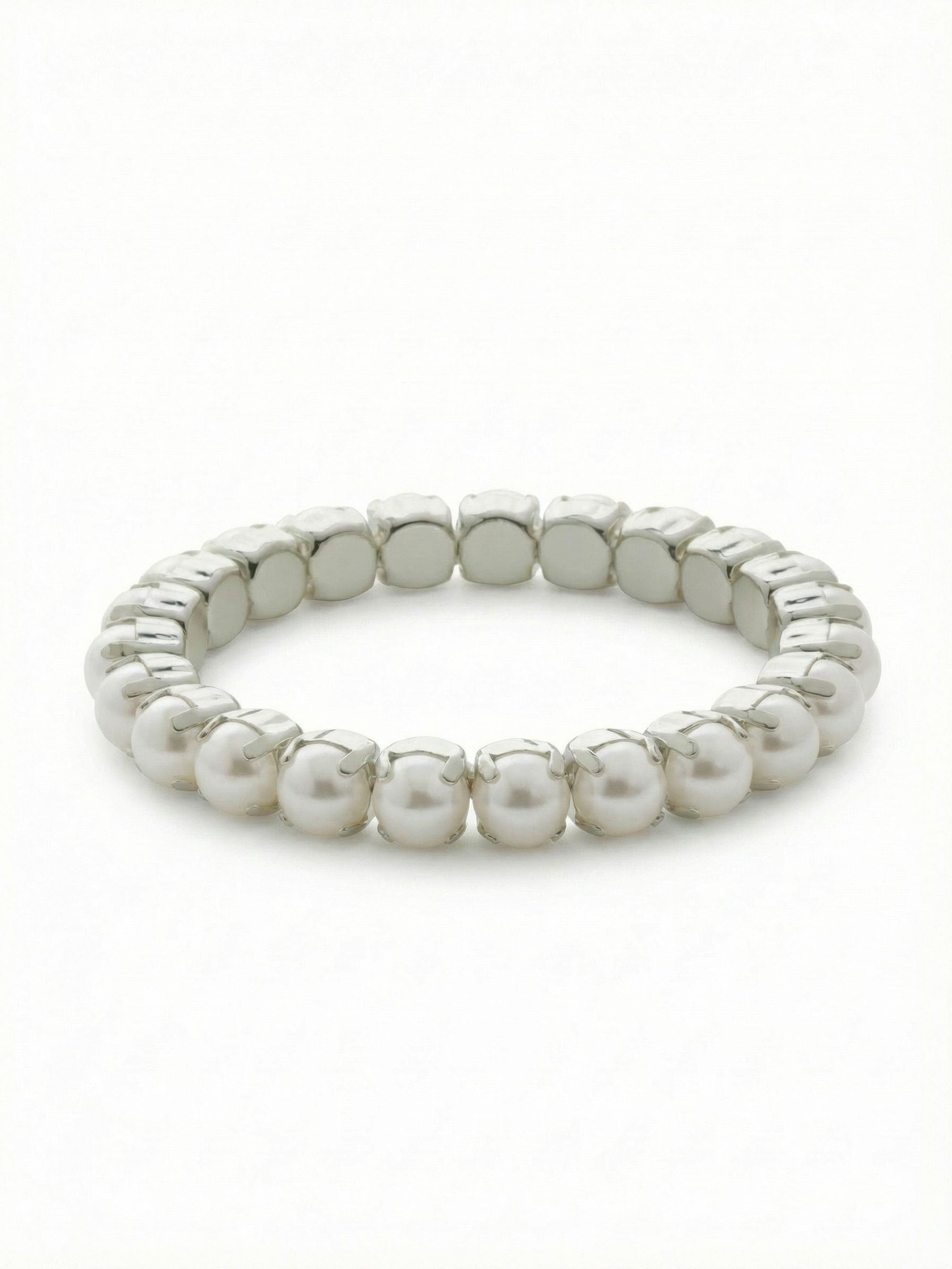 8 inch Sienna Stretch Bracelet - BFD60PDMDP - <p>A continuous row of snow white pearls is individually set in polished metal cups, creating an unbroken line of soft luster that wraps around your wrist. The flexible stretch construction means there are no clasps to fuss with when you are getting dressed. It carries a satisfying weight that feels substantial when worn alone, yet it slides easily into a stack of your favorite daily bracelets.</p><ul>
<li>Unbroken row of uniformly sized pearls creates a clean visual rhythm</li>
<li>Individual prong settings give an architectural feel to a classic material</li>
<li>Stretch easy slip-on design</li>
<li>Protective e-coat finish for lasting wear</li>
<li>Includes signature organza pouch for gifting and travel</li>
</ul>