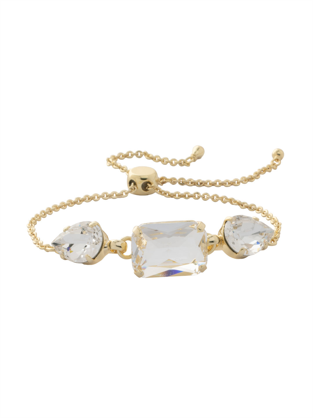 Celandine Slider Bracelet - BFG5BGCRY - <p>The Celandine Slider Bracelet features an emerald cut crystal surrounded by a single pear cut crystal on either side. From Sorrelli's Crystal collection in our Bright Gold-tone finish.</p>