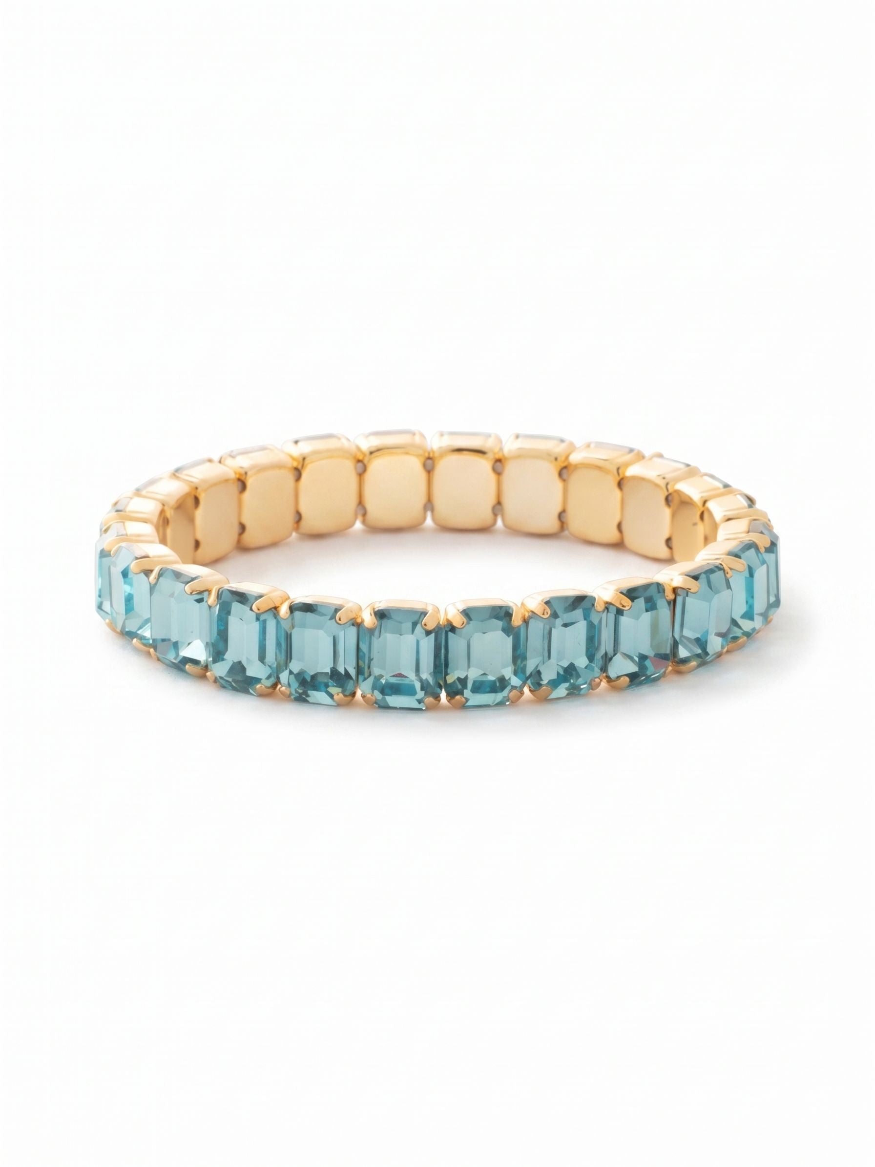 8 inch Octavia Stretch Bracelet - BFS17BGAQU - <p>The 8-inch Octavia Stretch Bracelet features a line of emerald cut crystals on a sturdy jewelers' filament, stretching to fit most wrists comfortably, without the hassle of a clasp! (8 inches, fits bigger wrist sizes) From Sorrelli's Aquamarine collection in our Bright Gold-tone finish.</p>