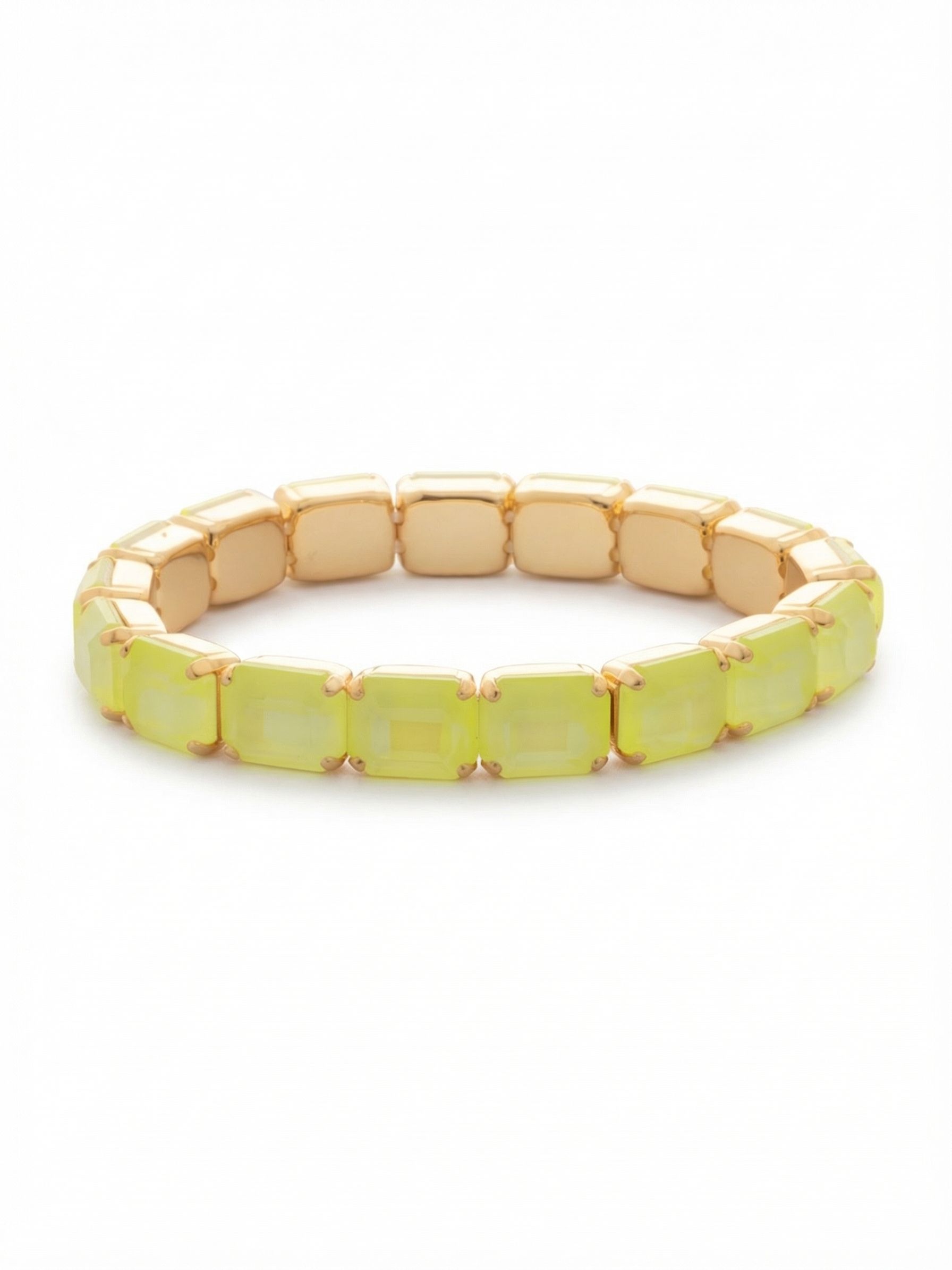 7 Inch Easton Emerald Cut Stretch Bracelet - BFS30BGELY - <p>Seventeen emerald-cut crystals form an unbroken line of vibrant electric yellow. The bright gold-tone settings frame each geometric stone, giving the piece a substantial weight that feels intentional as you move. Built with a concealed stretch cord, it slips directly over your hand without the fuss of a clasp. The clean architecture of the step-cut facets plays against the casual ease of a pull-on design, creating a bold, solid block of color for your wrist.</p><ul>
<li>Continuous line of architectural emerald-cut crystals</li>
<li>Flexible pull-on design with a solid block of color</li>
<li>Stretch easy slip-on design</li>
<li>Protective e-coat finish for lasting wear</li>
<li>Includes signature organza pouch for gifting and travel</li>
</ul>