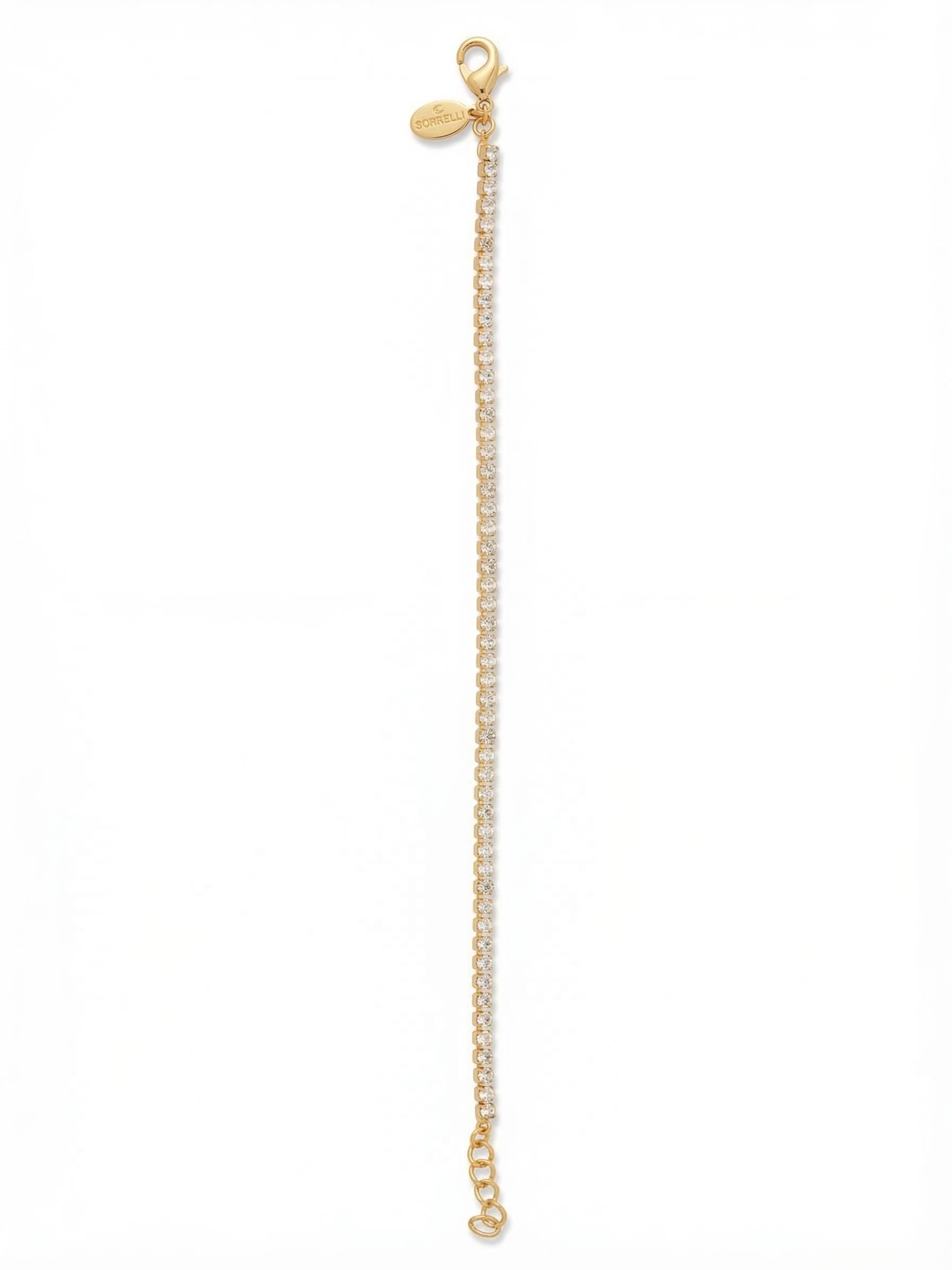Mini Marnie Tennis Bracelet - BFS32BGCRY - <p>A whisper of crystal for your wrist. The Mini Marnie Tennis Bracelet is an incredibly fine, continuous line of sparkle. Built on a delicate rhinestone chain, this piece moves fluidly with every gesture without catching or weighing you down. An included extension chain allows you to tailor the fit perfectly to your wrist. It reads as a quiet solo accent or the ideal foundational layer to build out a heavier stack.</p><ul>
<li>Ultra-fine rhinestone chain construction</li>
<li>Minimalist scale designed for seamless layering</li>
<li>Lobster claw clasp</li>
<li>3/4-inch adjustable extension chain</li>
<li>Protective e-coat finish for lasting wear</li>
<li>Includes signature organza pouch for gifting and travel</li>
</ul>