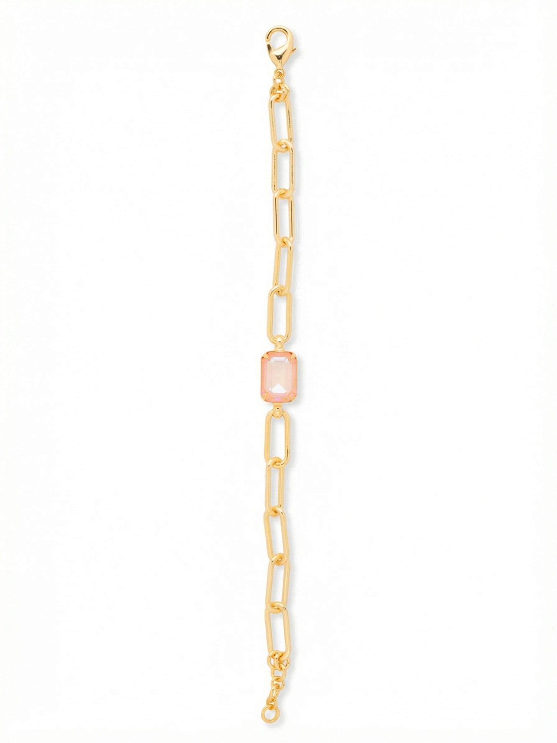 Nia Tennis Bracelet - BFS77BGPD - <p>A single emerald-cut crystal anchors this minimalist take on the classic chain bracelet. The soft peach focal point balances the clean, open links of the paperclip chain, offering a warm wash of color that shifts in the light as you move. An extension chain allows you to tailor the fit so the center stone stays exactly where you want it. It layers effortlessly with heavier cuffs or wears beautifully as a delicate solo piece.</p><ul>
<li>Single emerald-cut crystal focal point</li>
<li>Airy open-link paperclip chain construction</li>
<li>Lobster claw clasp</li>
<li>3/4-inch adjustable extension chain</li>
<li>Protective e-coat finish for lasting wear</li>
<li>Includes signature organza pouch for gifting and travel</li>
</ul>