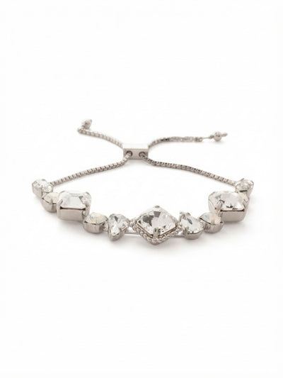 Izzy Slider Bracelet - BFY400PDCLA - <p>Anchored by a crisp square crystal in a detailed milgrain setting, the Izzy plays with sharp and soft geometry. Clear marquise and pear cuts alternate with the clouded glow of round white opals, building a structured rhythm that catches the light as you move. The flexible box chain draws cleanly through the adjustable slider, allowing the varied stones to balance securely in place. It offers a quiet study in scale and texture, holding its own whether stacked or worn solo.</p><ul>
<li>Mixes crisp square and marquise cuts with the clouded glow of white opal</li>
<li>Fluid box chain adjusts easily to balance the substantial central crystal cluster</li>
<li>Adjustable slider closure</li>
<li>Protective e-coat finish for lasting wear</li>
<li>Includes signature organza pouch for gifting and travel</li>
</ul>