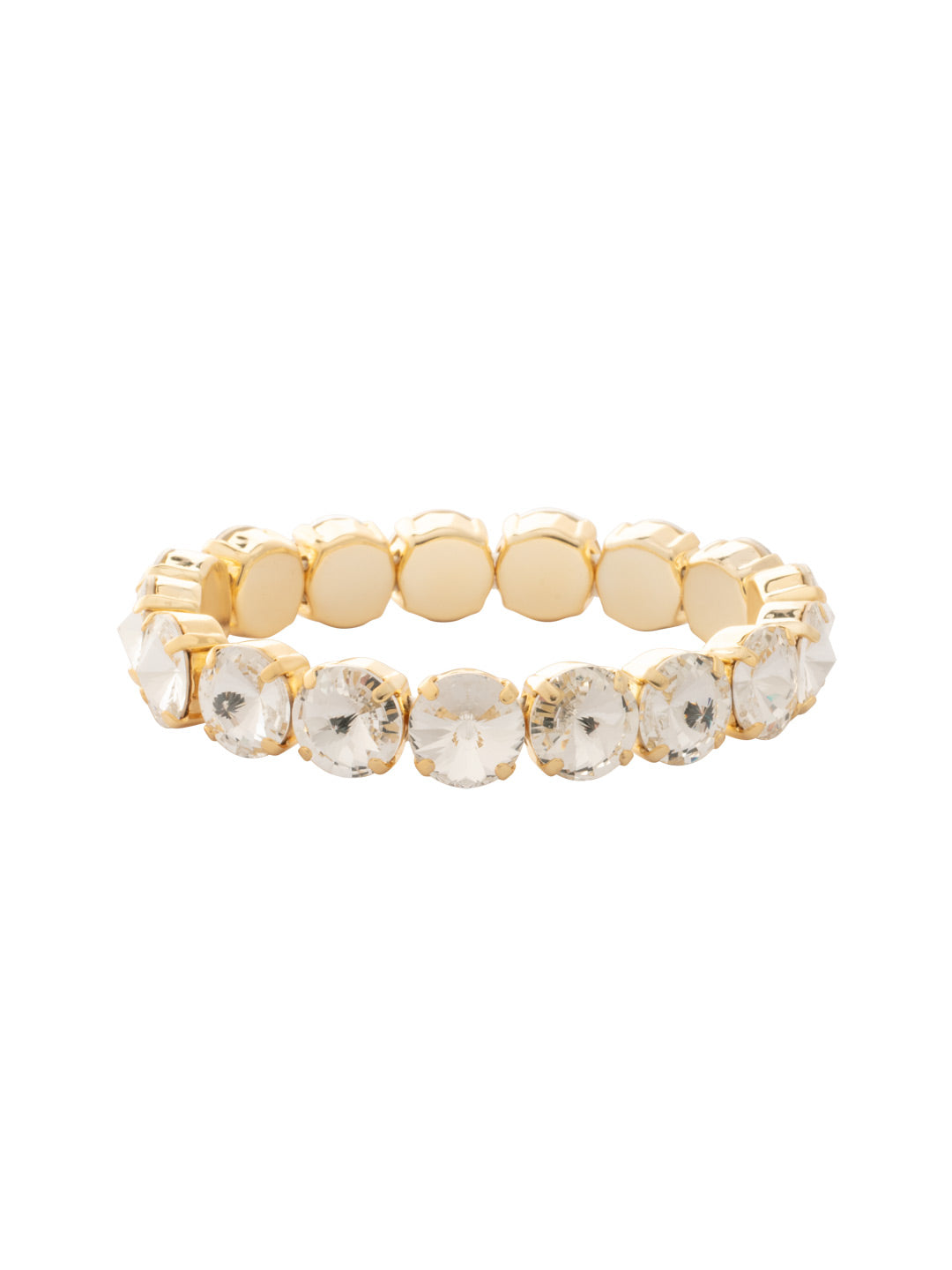 London Stretch Bracelet - BFY8BGCRY - <p>The London Stretch Bracelet features a line of rivoli round-cut crystals on a sturdy jewelers' filament, stretching to fit most wrists comfortably, without the hassle of a clasp! (7 inches in diameter, fits average wrist sizes) From Sorrelli's Crystal collection in our Bright Gold-tone finish.</p>