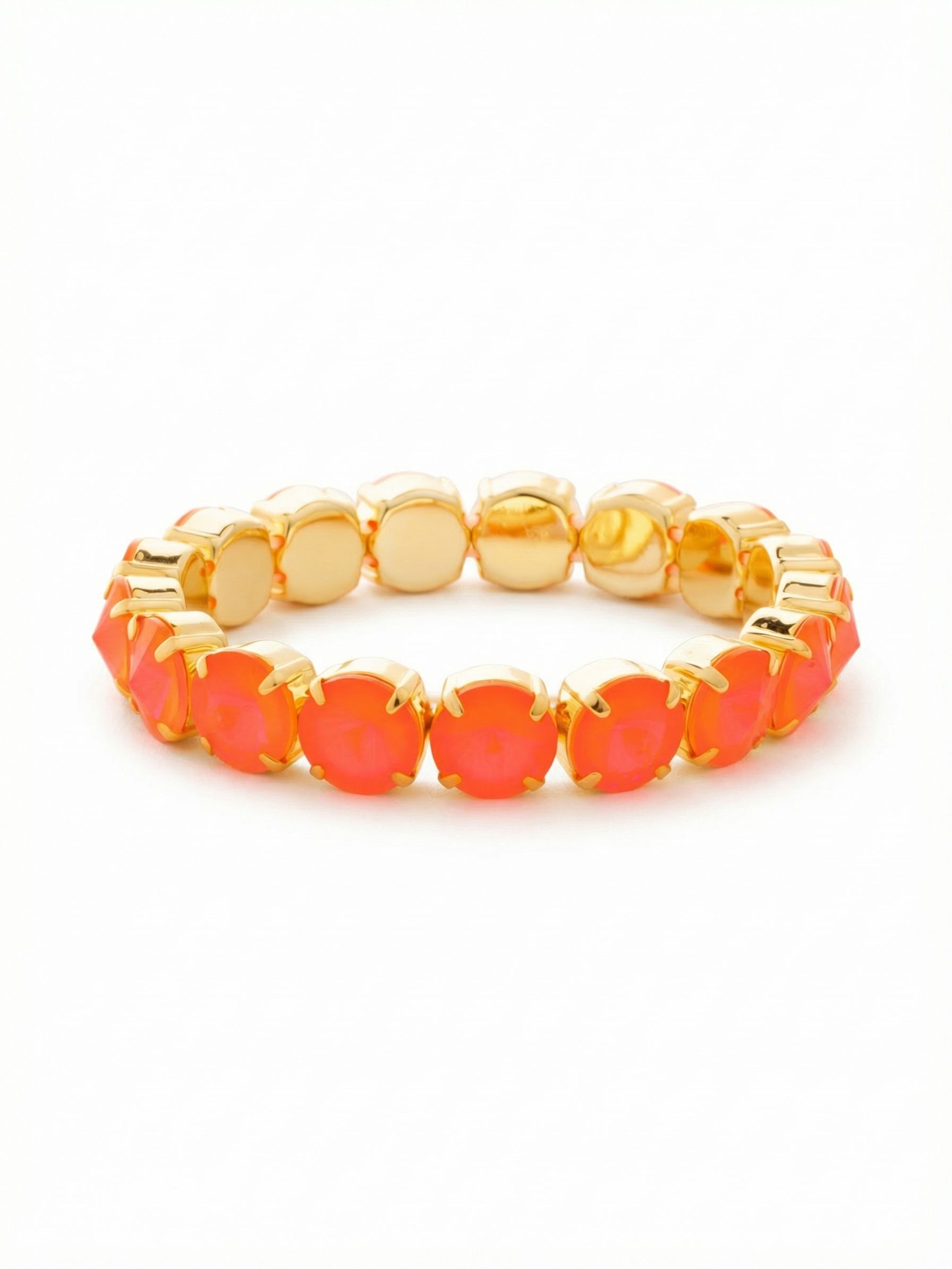 London Stretch Bracelet - BFY8BGELH - <p>A slip-on design that brings immediate energy to your wrist. Large, deeply faceted crystals in a vibrant neon orange catch the light from every angle, held securely in prong settings. The stretch construction makes it effortless to pull on, offering a forgiving fit that moves naturally with your arm throughout the day. Worn as a single pop of saturated color alongside a tailored cuff or mixed into a layered stack, it adds an instant lift to your daily rotation.</p><ul>
<li>Deeply faceted round crystals with a distinct pointed profile</li>
<li>Substantial half-inch width for a bold standalone presence</li>
<li>Stretch easy slip-on design</li>
<li>Protective e-coat finish for lasting wear</li>
<li>Includes signature organza pouch for gifting and travel</li>
</ul>