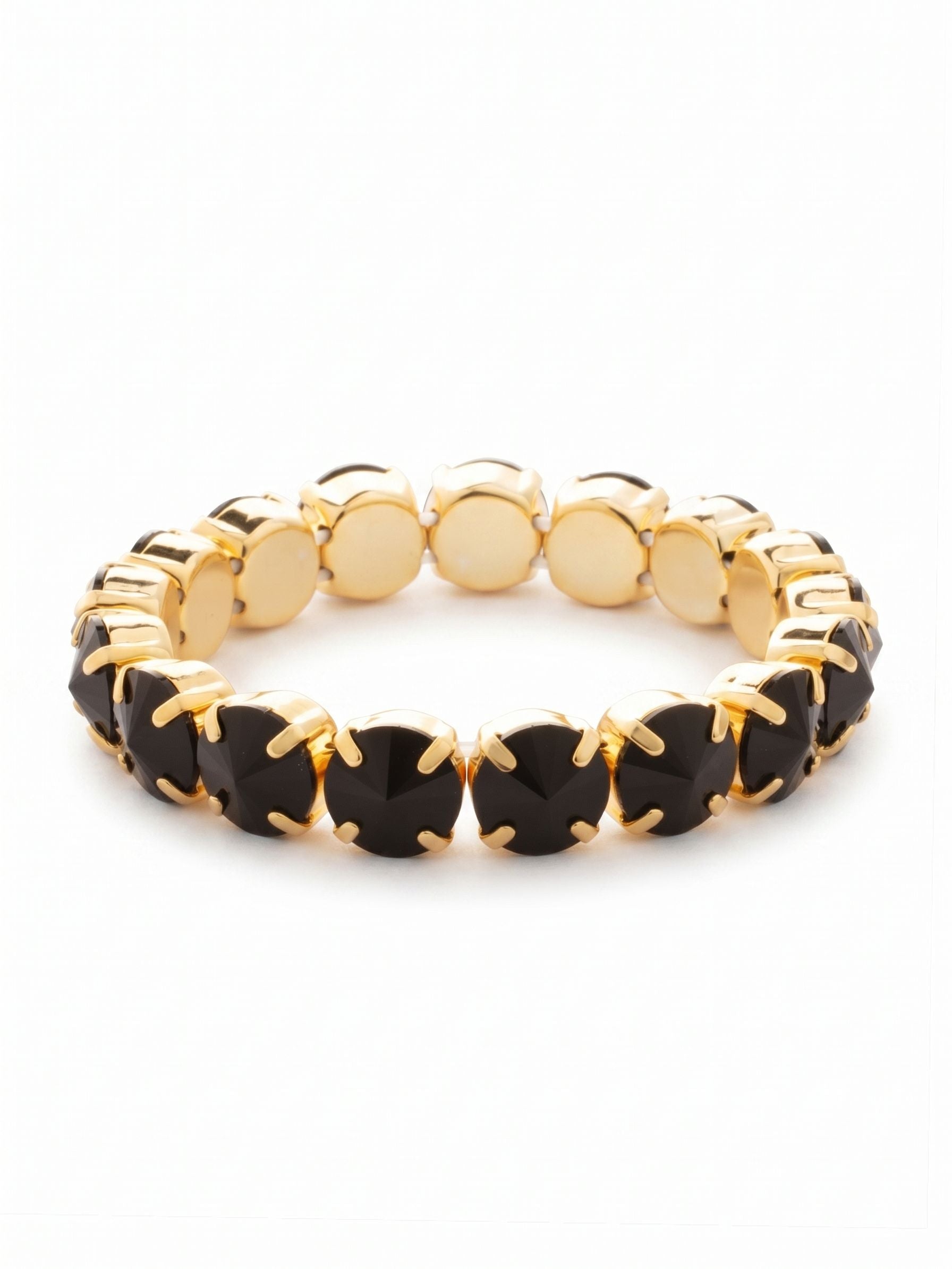 London Stretch Bracelet - BFY8BGJET - <p>The London Stretch Bracelet features a line of rivoli round-cut crystals on a sturdy jewelers' filament, stretching to fit most wrists comfortably, without the hassle of a clasp! (7 inches in diameter, fits average wrist sizes) From Sorrelli's Jet collection in our Bright Gold-tone finish.</p>
