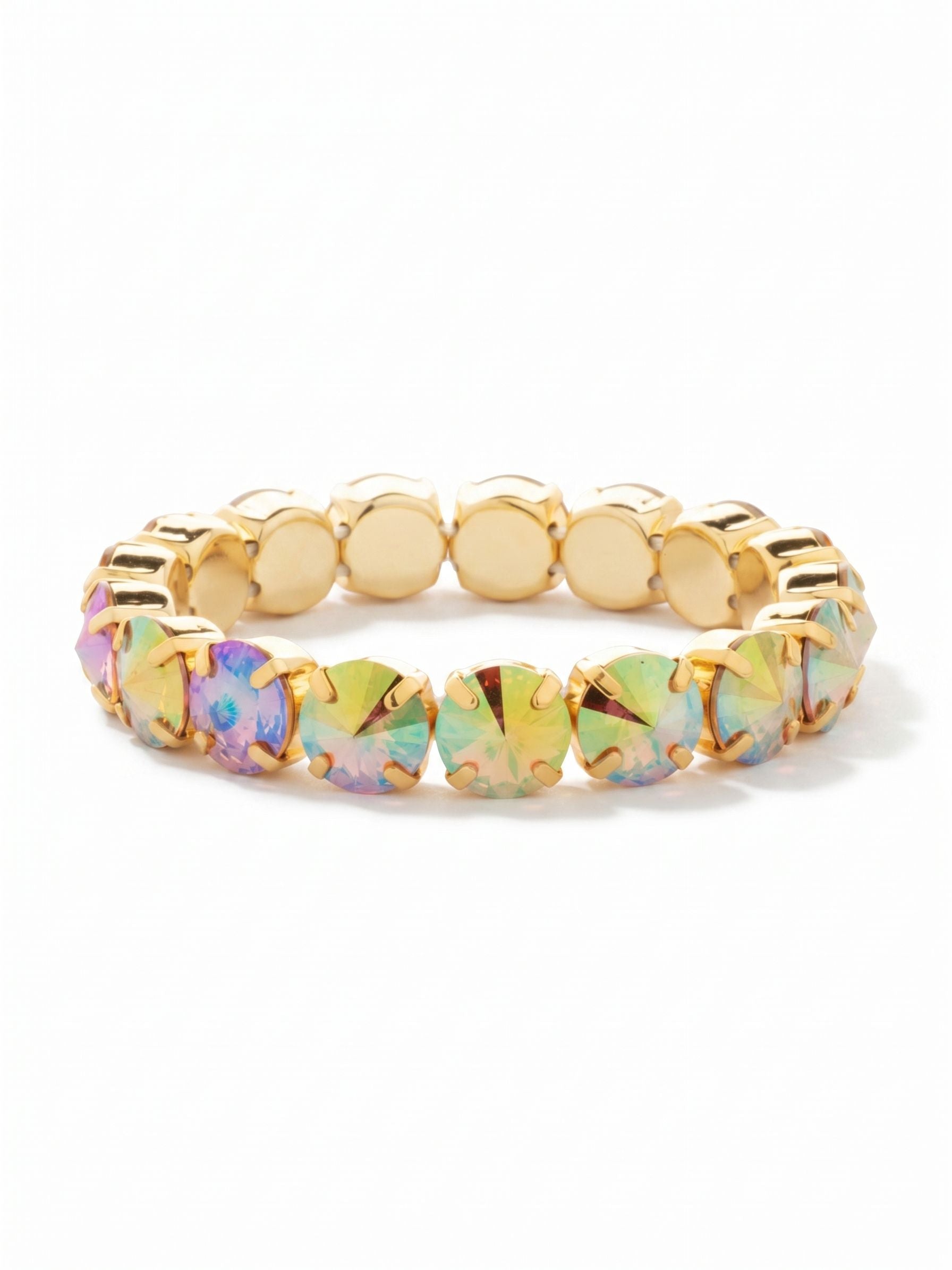 London Stretch Bracelet - BFY8BGLCA - <p>Large, faceted crystals create a continuous loop of shifting color. The iridescent finish catches the light with every gesture, revealing subtle flashes of pink and gold. Designed with an internal stretch cord, this piece slips on effortlessly as you head out the door. It carries enough weight to feel substantial and intentional, easily holding its own when worn solo or anchoring a larger stack of favorites.</p><ul>
<li>Continuous band of oversized round-cut crystals</li>
<li>Iridescent finish creates shifting color profiles</li>
<li>Stretch easy slip-on design</li>
<li>Protective e-coat finish for lasting wear</li>
<li>Includes signature organza pouch for gifting and travel</li>
</ul>