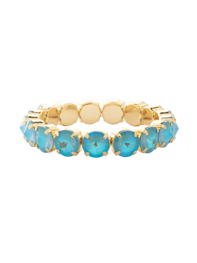 London Stretch Bracelet - BFY8BGSBD - <p>The London Stretch Bracelet features a line of rivoli round-cut crystals on a sturdy jewelers' filament, stretching to fit most wrists comfortably, without the hassle of a clasp! (7 inches in diameter, fits average wrist sizes) From Sorrelli's Summer Blue Delite collection in our Bright Gold-tone finish.</p>