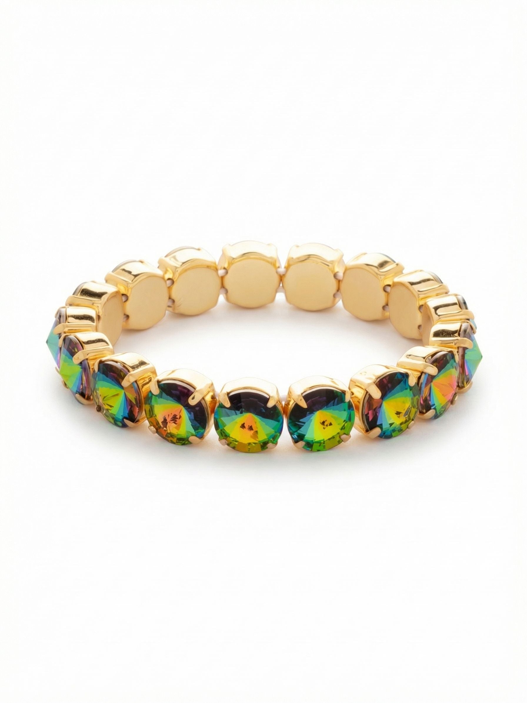 London Stretch Bracelet - BFY8BGVO - <p>This stretch bracelet slides onto your wrist effortlessly, offering immediate color and presence. Seventeen large round-cut crystals create a continuous band of vibrant light. The substantial half-inch width provides confident weight without a complicated clasp to slow down your morning routine. As you move, the deeply faceted stones reveal bright flashes of green, gold, and violet. It easily holds its own as a solo piece or acts as the bold anchor of your favorite layered stack.</p><ul>
<li>Continuous band of oversized round crystals for unbroken color</li>
<li>Deeply faceted stones that transition through multiple vibrant hues</li>
<li>Stretch easy slip-on design</li>
<li>Protective e-coat finish for lasting wear</li>
<li>Includes signature organza pouch for gifting and travel</li>
</ul>