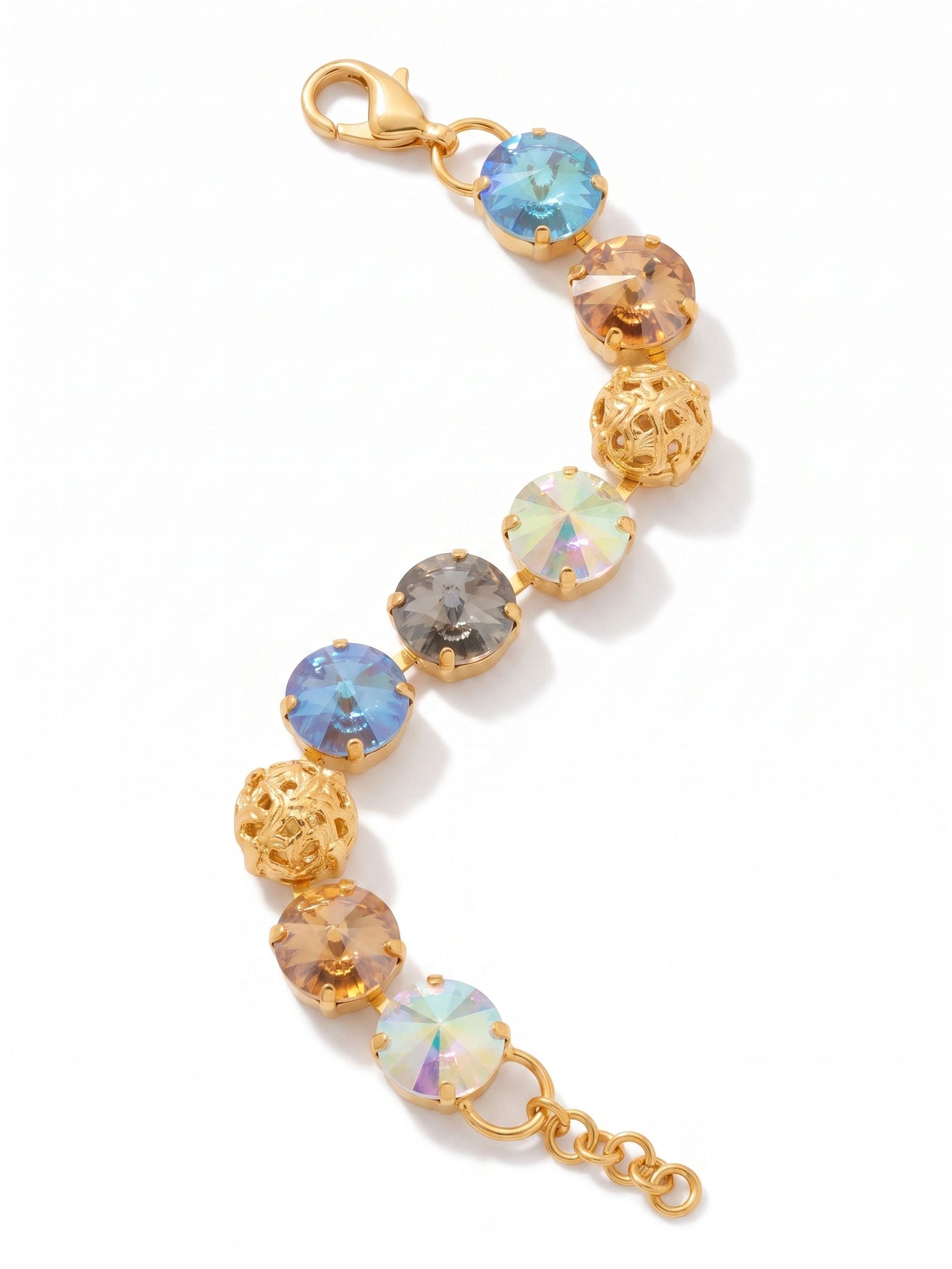 Clementine Tennis Bracelet - BFZ180BGHNB - <p>The Clementine Tennis Bracelet features round, rivoli-cut crystals with ornate, domed metal accents; adjustable and secured with a lobster claw clasp. From Sorrelli's Honey Bourbon collection in our Bright Gold-tone finish.</p>