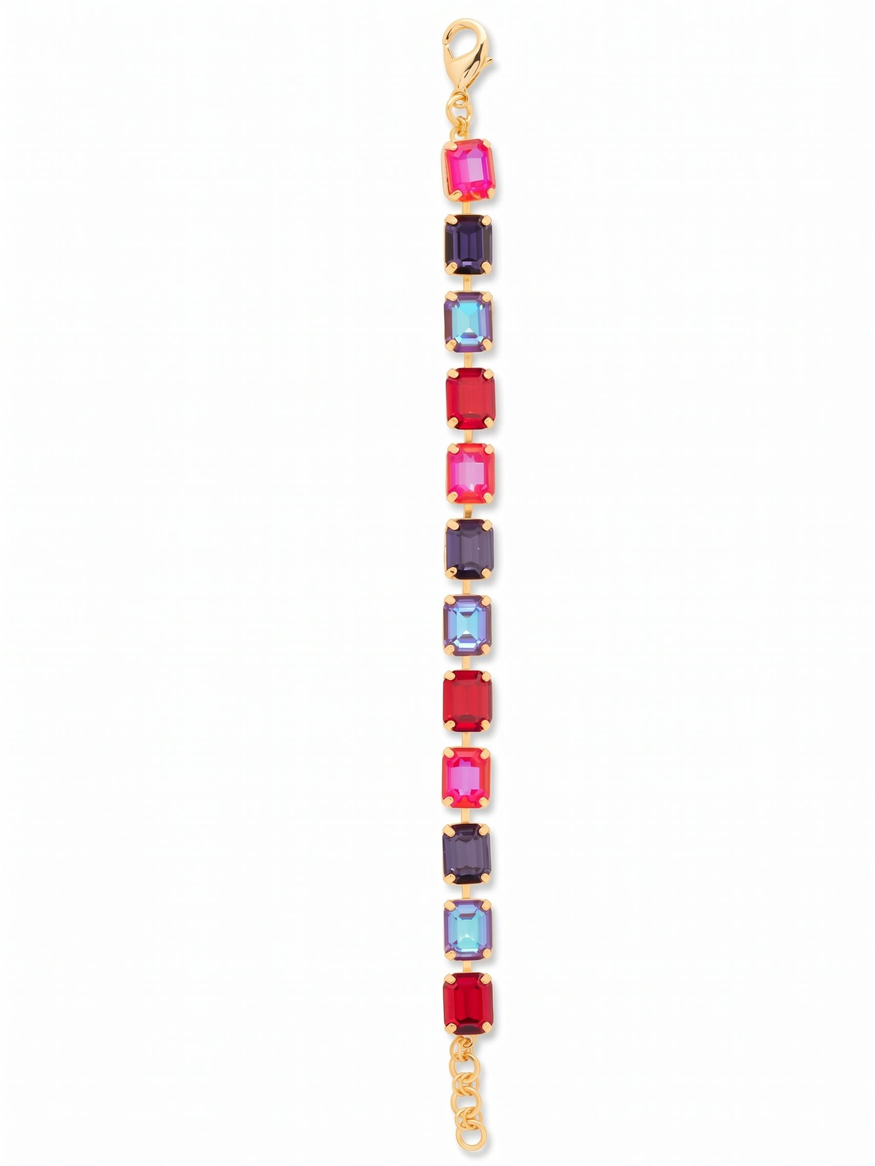 Octavia Repeating Tennis Bracelet - BFZ6BGREV - <p>Twelve sizable emerald-cut crystals line up in a repeating sequence of deep reds and rich purples. The kette chain construction gives each stone room to move independently as you gesture, casting light across the room. An extension chain lets you adjust the tension exactly to your liking. Wear it to give a simple dark sweater an immediate infusion of warm color and architectural structure.</p><ul>
<li>Repeating sequence of emerald-cut crystals in deep crimson and violet hues</li>
<li>Articulated kette chain construction allows individual stone movement</li>
<li>Lobster claw clasp</li>
<li>3/4-inch adjustable extension chain</li>
<li>Protective e-coat finish for lasting wear</li>
<li>Includes signature organza pouch for gifting and travel</li>
</ul>