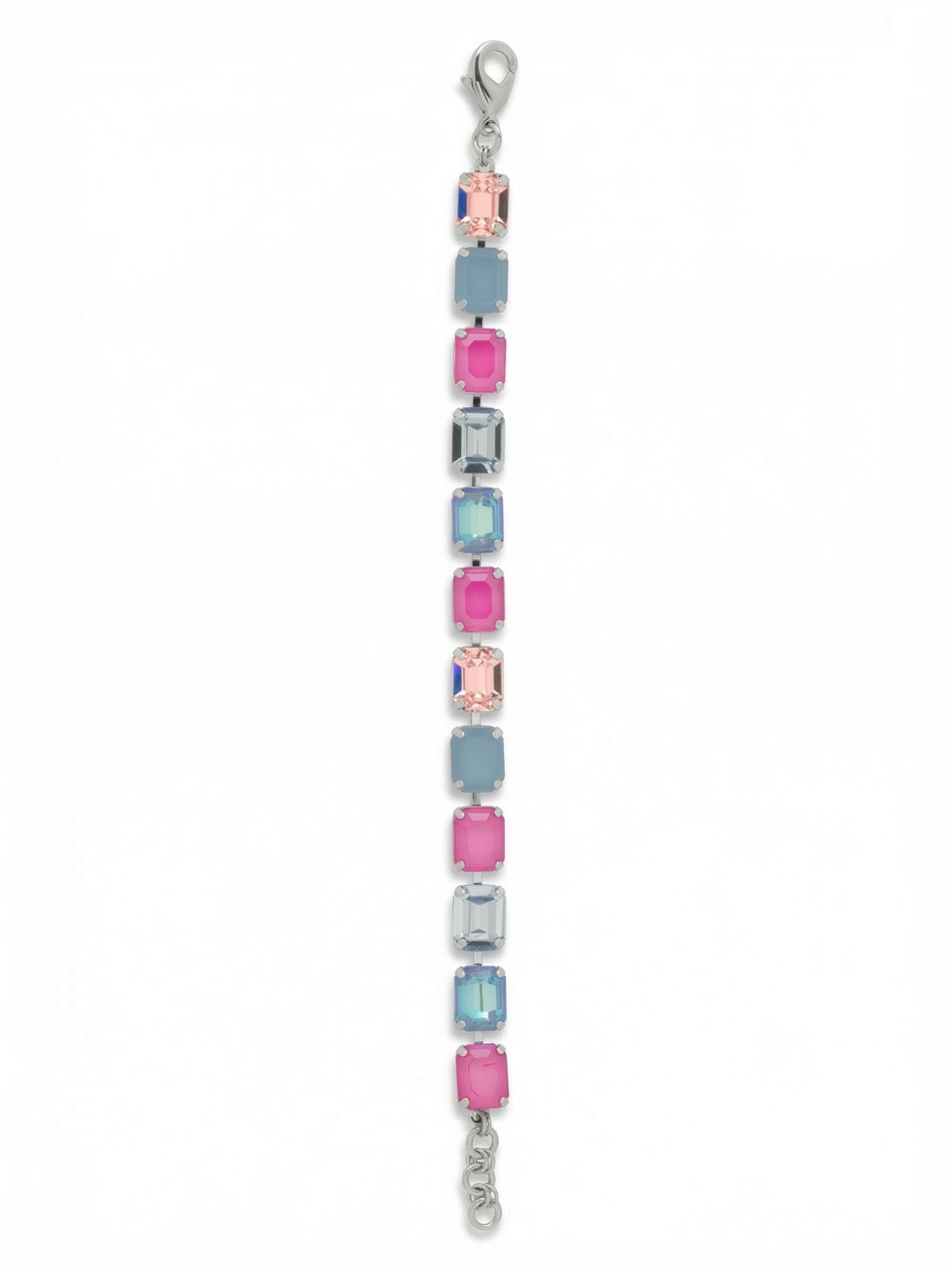 Octavia Repeating Tennis Bracelet - BFZ6PDPBZ - <p>A continuous line of emerald-cut crystals creates a steady visual rhythm on the arm. Alternating cool blues and soft pinks catch the light with every gesture, bringing a deliberate wash of color to your daily routine. Built on a linked channel chain, the stones maintain constant, fluid movement as you go about your day. An integrated extension chain lets you adjust the length, allowing the piece to drape exactly how you want it to.</p><ul>
<li>Continuous row of uniform emerald cut crystals</li>
<li>Articulated channel setting for fluid movement</li>
<li>Lobster claw clasp</li>
<li>3/4-inch adjustable extension chain</li>
<li>Protective e-coat finish for lasting wear</li>
<li>Includes signature organza pouch for gifting and travel</li>
</ul>