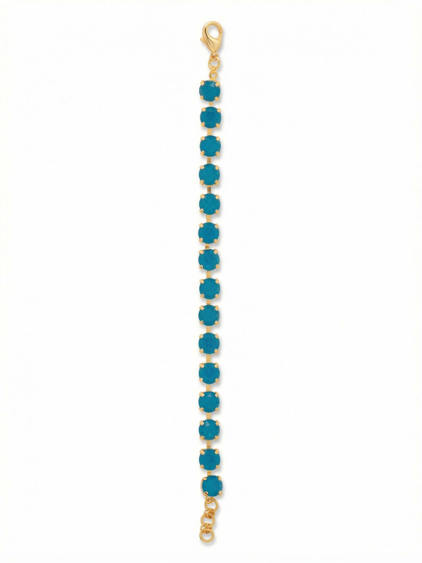 Sienna Tennis Bracelet - BGA2BGCBO - <p>An unbroken line of vibrant Caribbean blue circles the wrist in this classic tennis silhouette. Round-cut crystals are securely prong-set in a fluid channel chain, allowing the piece to move naturally with your hand as you go about your day. The bright opaque stones offer a concentrated wash of color that easily anchors a layered stack or stands confidently on its own. An extension chain lets you find your preferred drape.</p><ul>
<li>Continuous line of uniform round-cut crystals</li>
<li>Flexible channel chain construction follows your movement</li>
<li>Lobster claw clasp</li>
<li>3/4-inch adjustable extension chain</li>
<li>Protective e-coat finish for lasting wear</li>
<li>Includes signature organza pouch for gifting and travel</li>
</ul>