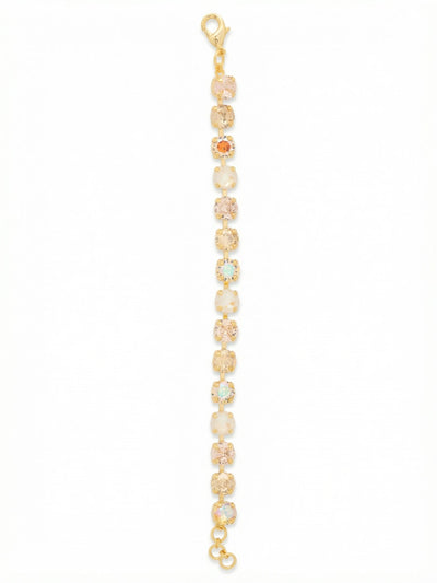 Sienna Tennis Bracelet - BGA2BGGGO - <p>Warm, round-cut crystals in champagne, vintage rose, and bright aurora borealis form an unbroken line of light. Built on a flexible channel chain, the stones maintain a perfectly aligned sequence while adapting naturally to your shape as you move. This piece brings subtle warmth to your daily rotation, working just as well as a solitary accent or mixed into a layered stack. A short extension chain lets you find the exact right fit for continuous wear.</p><ul>
<li>Alternating warm crystal tones and iridescent aurora borealis create a dynamic color shift</li>
<li>Flexible channel chain construction keeps the round stones facing outward in motion</li>
<li>Lobster claw clasp</li>
<li>3/4-inch adjustable extension chain</li>
<li>Protective e-coat finish for lasting wear</li>
<li>Includes signature organza pouch for gifting and travel</li>
</ul>
