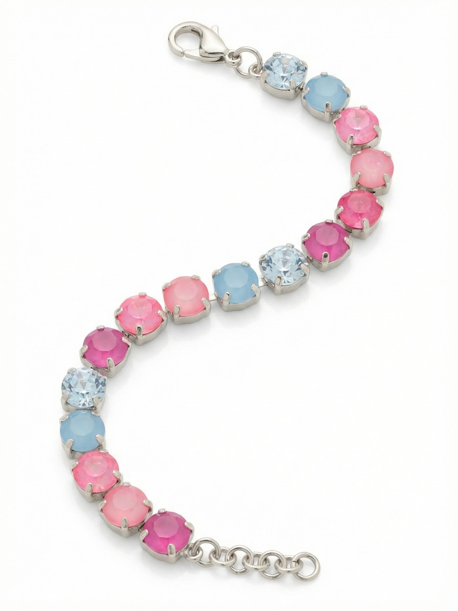 Sienna Tennis Bracelet - BGA2PDPBZ - <p>The channel chain construction creates a fluid line of color that wraps continuously and moves naturally with your arm. Round-cut crystals alternate in a deliberate rhythm, shifting from icy light sapphire and milky opal tones into vivid washes of electric and deep lacquer pink. The substantial palladium setting anchors the airy color palette, giving the piece a satisfying weight. An extension chain allows you to tailor the drape exactly to your preference.</p><ul>
<li>Fluid channel-set kette construction designed for continuous movement</li>
<li>Rhythmic color progression shifting from icy cool blues to vivid pinks</li>
<li>Lobster claw clasp</li>
<li>3/4-inch adjustable extension chain</li>
<li>Protective e-coat finish for lasting wear</li>
<li>Includes signature organza pouch for gifting and travel</li>
</ul>