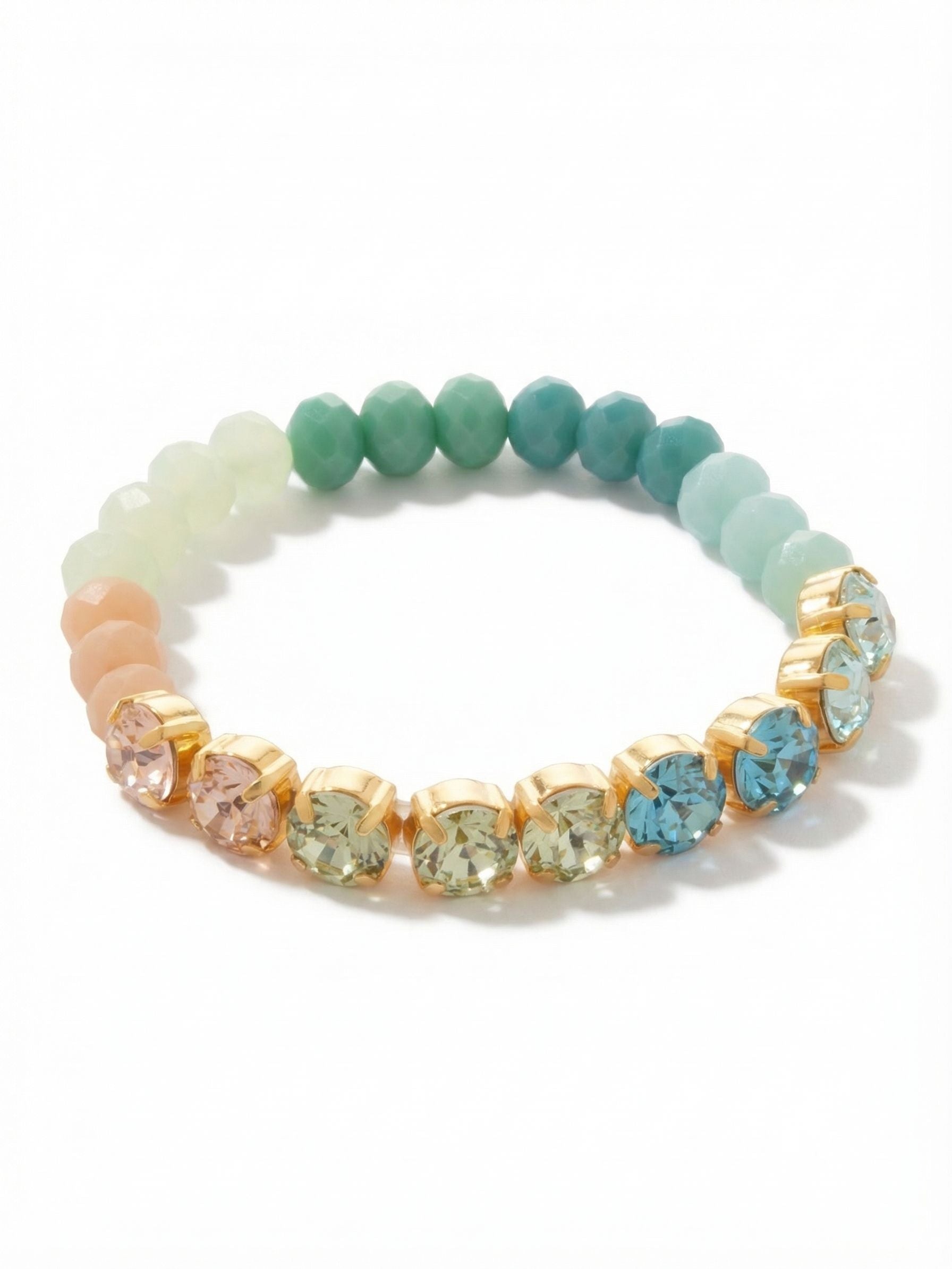 Charleston Stretch Bracelet - BGE1BGCSD - <p>Half faceted round crystals in soft peach, chrysolite, and aquamarine meet a continuous band of opaque, color-blocked beads. This piece bridges the gap between classic sparkle and casual texture. The seamless stretch design glides easily over your hand without the need to navigate tricky clasps. It settles comfortably into your daily rotation, adding a fluid transition of warm and cool coastal tones to a curated stack or holding its own alongside a favorite watch.</p><ul>
<li>Half-and-half design pairing prong-set crystals with opaque beads</li>
<li>Seamless stretch band that glides easily over the hand</li>
<li>Stretch easy slip-on design</li>
<li>Protective e-coat finish for lasting wear</li>
<li>Includes signature organza pouch for gifting and travel</li>
</ul>