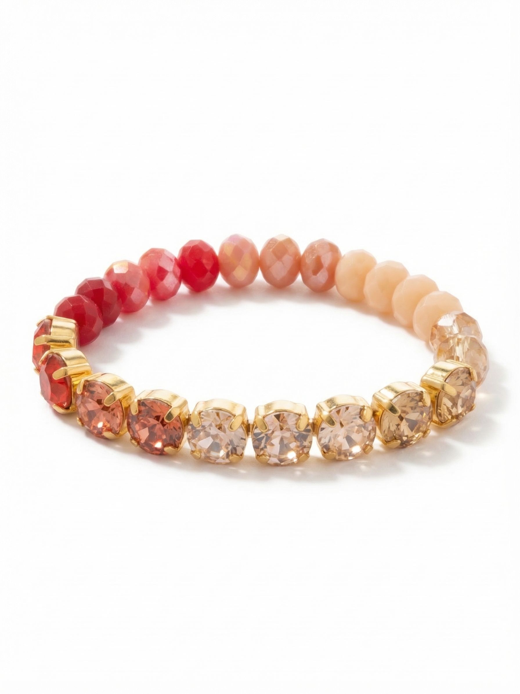 Charleston Stretch Bracelet - BGE1BGMOR - <p>A warm wash of color that rolls effortlessly over the hand. This stretch design plays with texture, pairing bright prong-set crystals with a strand of softly faceted beads in a gradient of coral, blush, and porcelain red. The flexible construction allows it to adapt to your movement, offering comfortable, all-day wear without the need for a clasp. Slide it on solo for a subtle touch of light, or mix it into a layered stack to build your own textured landscape.</p><ul>
<li>Half prong-set crystals and half strung faceted beads</li>
<li>Gradient transition from deep coral to soft peach</li>
<li>Stretch easy slip-on design</li>
<li>Protective e-coat finish for lasting wear</li>
<li>Includes signature organza pouch for gifting and travel</li>
</ul>