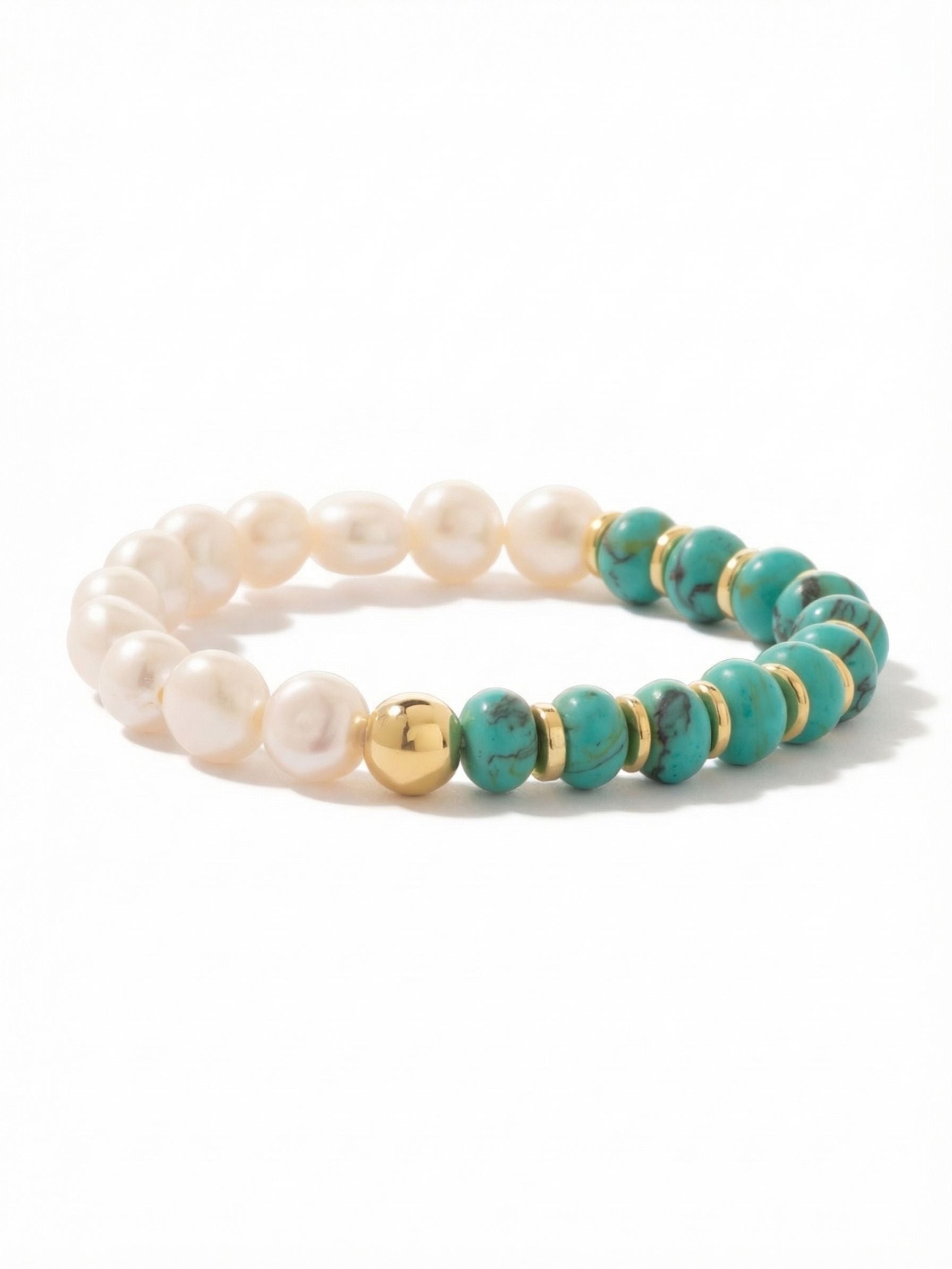 Isle of Palms Stretch Bracelet - BGE3BGTQ - <p>Half luminous white baroque pearls and half vibrant turquoise rondelle beads give this stretch design two distinct moods. Thin gold-tone discs separate the turquoise stones, adding a subtle glint as your hand moves, while a single polished metallic bead marks the transition between the contrasting textures. The flexible band rolls easily over your hand without the need to manage a tiny clasp. It brings an immediate wash of color to a casual cuff stack or anchors your wrist effortlessly on its own.</p><ul>
<li>Asymmetrical half-pearl and half-turquoise bead composition</li>
<li>Metallic spacer discs create visual rhythm between the stones</li>
<li>Stretch easy slip-on design</li>
<li>Protective e-coat finish for lasting wear</li>
<li>Includes signature organza pouch for gifting and travel</li>
</ul>