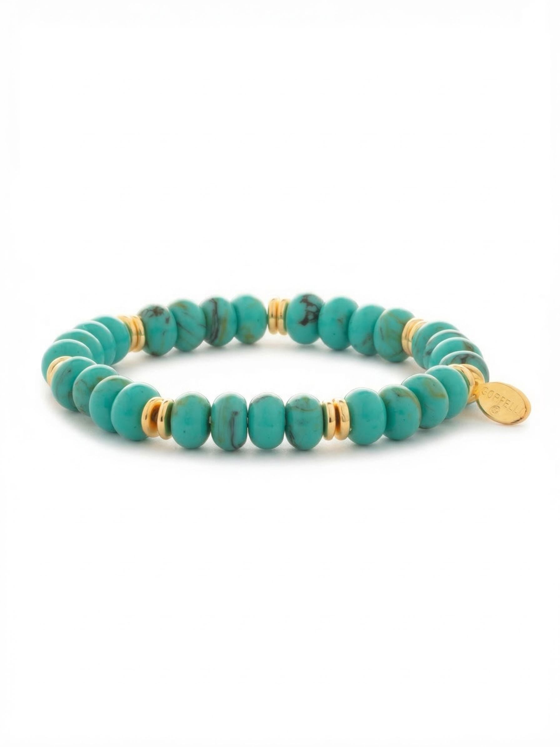 Capri Beaded Stretch Bracelet - BGE4BGTQ - <p>Smooth turquoise rondelle beads form a continuous band of vivid color and natural veining. Bright metallic spacers are placed thoughtfully throughout the loop, adding a quiet rhythm that catches the light as you move. The stretch cord design lets you slip it easily over your hand without fumbling with a clasp. It carries enough weight to anchor a mixed stack but holds its own perfectly when worn alone on a casual afternoon.</p><ul>
<li>Smooth rondelle beads reveal natural variations in color and veining</li>
<li>Ribbed metallic spacers create a visual rhythm throughout the band</li>
<li>Stretch easy slip-on design</li>
<li>Protective e-coat finish for lasting wear</li>
<li>Includes signature organza pouch for gifting and travel</li>
</ul>