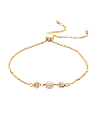 Eternity Slider Bracelet - BGF4BGMDP - <p>Embrace simple elegance with the dainty Eternity Slider Bracelet, featuring a central pearl nestled between two metallic hearts. Designed for a custom fit, the delicate chain is finished with an adjustable slider mechanism that suits most wrist sizes. From Sorrelli's Modern Pearl collection in our Bright Gold-tone finish.</p>