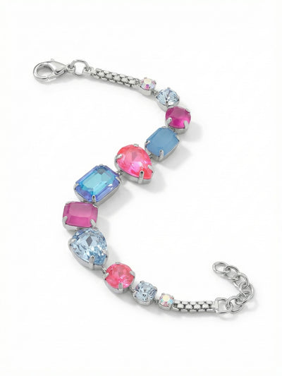 Moxie Tennis Bracelet - BGI3PDPBZ - <p>A pliable mesh chain anchors an asymmetrical progression of vibrant peony pink and oceanic blue crystals. The varied emerald, pear, and round cuts catch the light uniquely as your hand moves, offering a dynamic sequence of color and shape. It adds a deliberate focal point to a stack of simple silver chains, or brings enough texture to stand independently. An extension chain allows you to tailor the fit exactly to your preference for comfortable, continuous wear.</p><ul>
<li>Asymmetrical arrangement of emerald, pear, and round crystals</li>
<li>Pliable mesh chain construction provides fluid movement and texture</li>
<li>Lobster claw clasp</li>
<li>3/4-inch adjustable extension chain</li>
<li>Protective e-coat finish for lasting wear</li>
<li>Includes signature organza pouch for gifting and travel</li>
</ul>