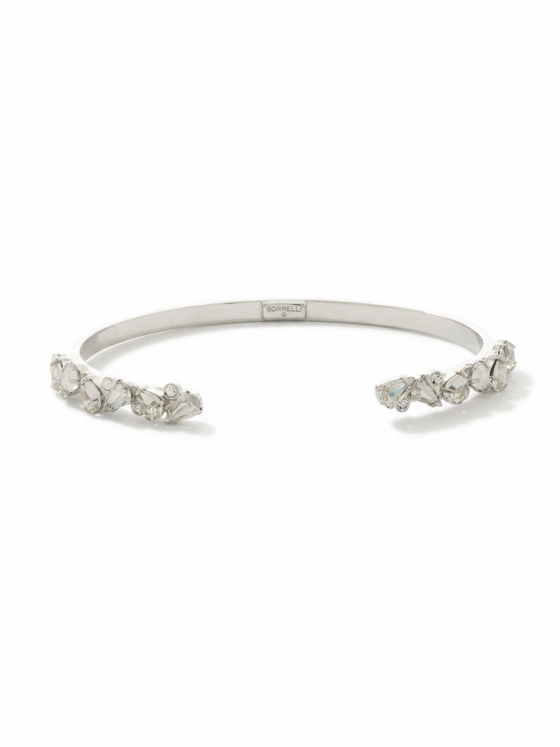 Eloise Cuff Bracelet - BGJ3PDCRY - <p>An open cuff designed for instant polish on busy mornings. The sleek band guides the eye toward the opening, where clustered pear and round clear crystals create a concentrated catch of light. The open construction makes it effortless to put on and take off with one hand. It holds its shape comfortably whether worn solo alongside a tailored sleeve or woven into your favorite daily stack.</p><ul>
<li>Clustered pear and round crystals concentrated at the open ends</li>
<li>Slender polished band that highlights the crystal accents</li>
<li>Adjustable open cuff slides on easily</li>
<li>Protective e-coat finish for lasting wear</li>
<li>Includes signature organza pouch for gifting and travel</li>
</ul>