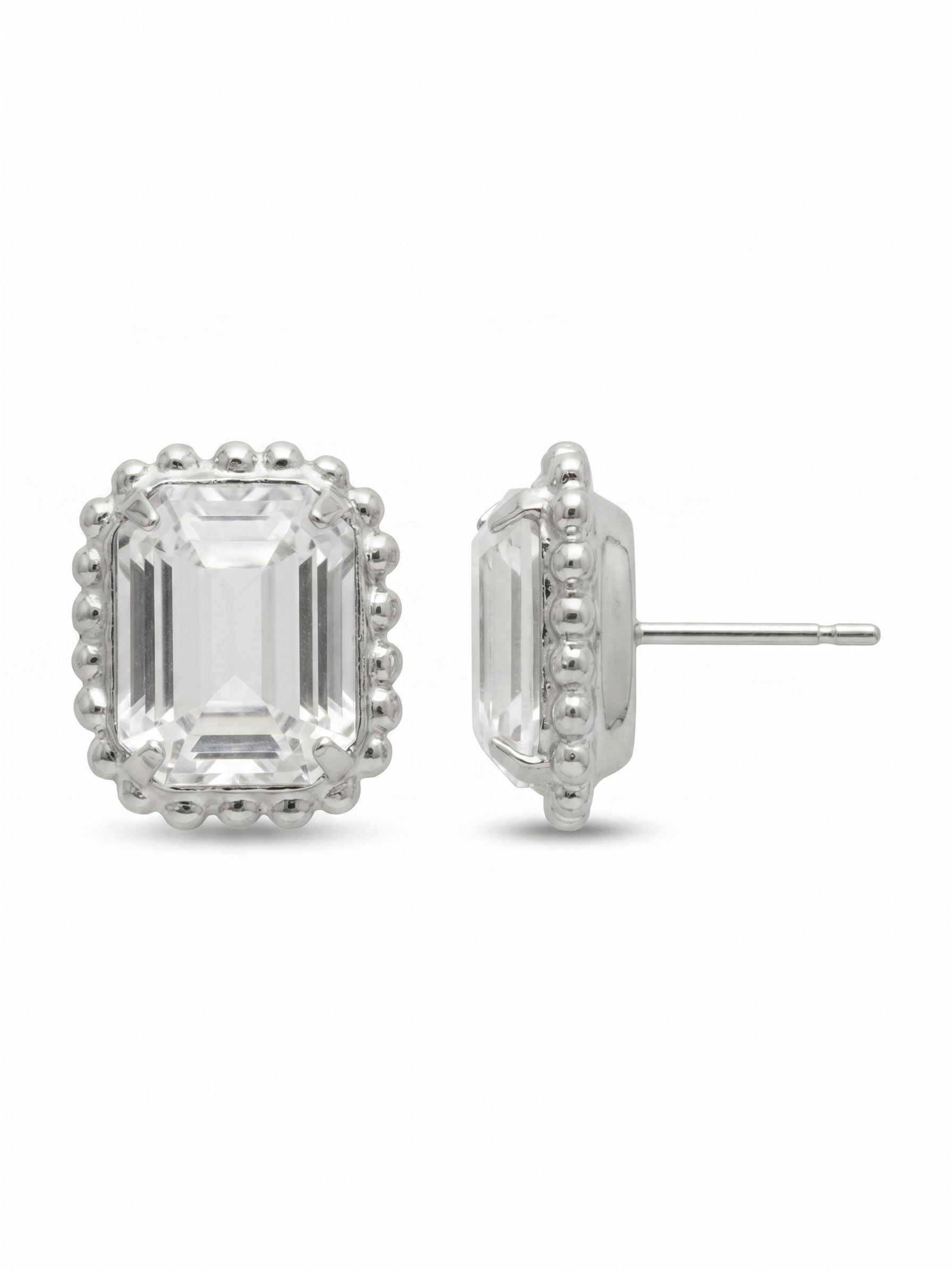 Octavia Scalloped Stud Earrings - EBW18PDCRY - <p>An emerald-cut clear crystal catches the light with clean, architectural lines, framed by a soft beaded border. This stud strikes a balance between crisp geometry and subtle texture, offering noticeable presence at conversation distance without feeling heavy. An oversized comfort clutch back keeps the piece secure and perfectly positioned all day, bringing an effortless polish to your daily rotation.</p><ul>
<li>Crisp emerald-cut clear crystal framed by a textured ball chain border</li>
<li>Geometric step cuts that create deep linear flashes of light</li>
<li>Post with oversized comfort-clutch back</li>
<li>Protective e-coat finish for lasting wear</li>
<li>Includes signature organza pouch for gifting and travel</li>
</ul>