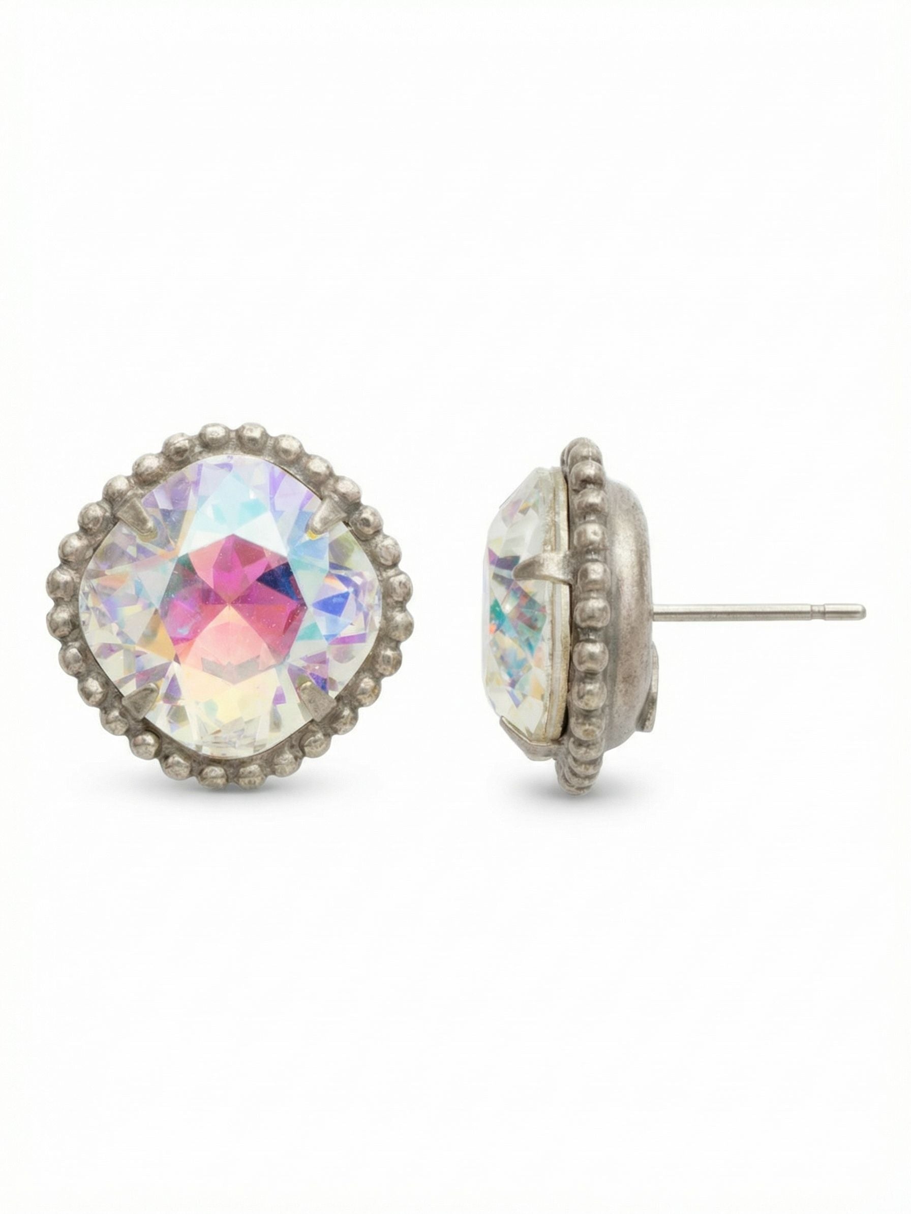 Cushion-Cut Solitaire Stud Earrings - EBX10ASCAB - <p>A single cushion-cut crystal anchors this substantial stud earring. At over half an inch across, it offers significant presence while remaining close to the face. Up close, a delicate border of ball chain adds a tactile edge to the setting, grounding the constant color shifts of the Aurora Borealis crystal. Designed for daily wear, an oversized comfort clutch keeps the piece securely balanced from morning until night.</p><ul>
<li>Oversized cushion-cut crystal center</li>
<li>Framed by a continuous border of textured ball chain</li>
<li>Post with oversized comfort-clutch back</li>
<li>Includes signature organza pouch for gifting and travel</li>
</ul>