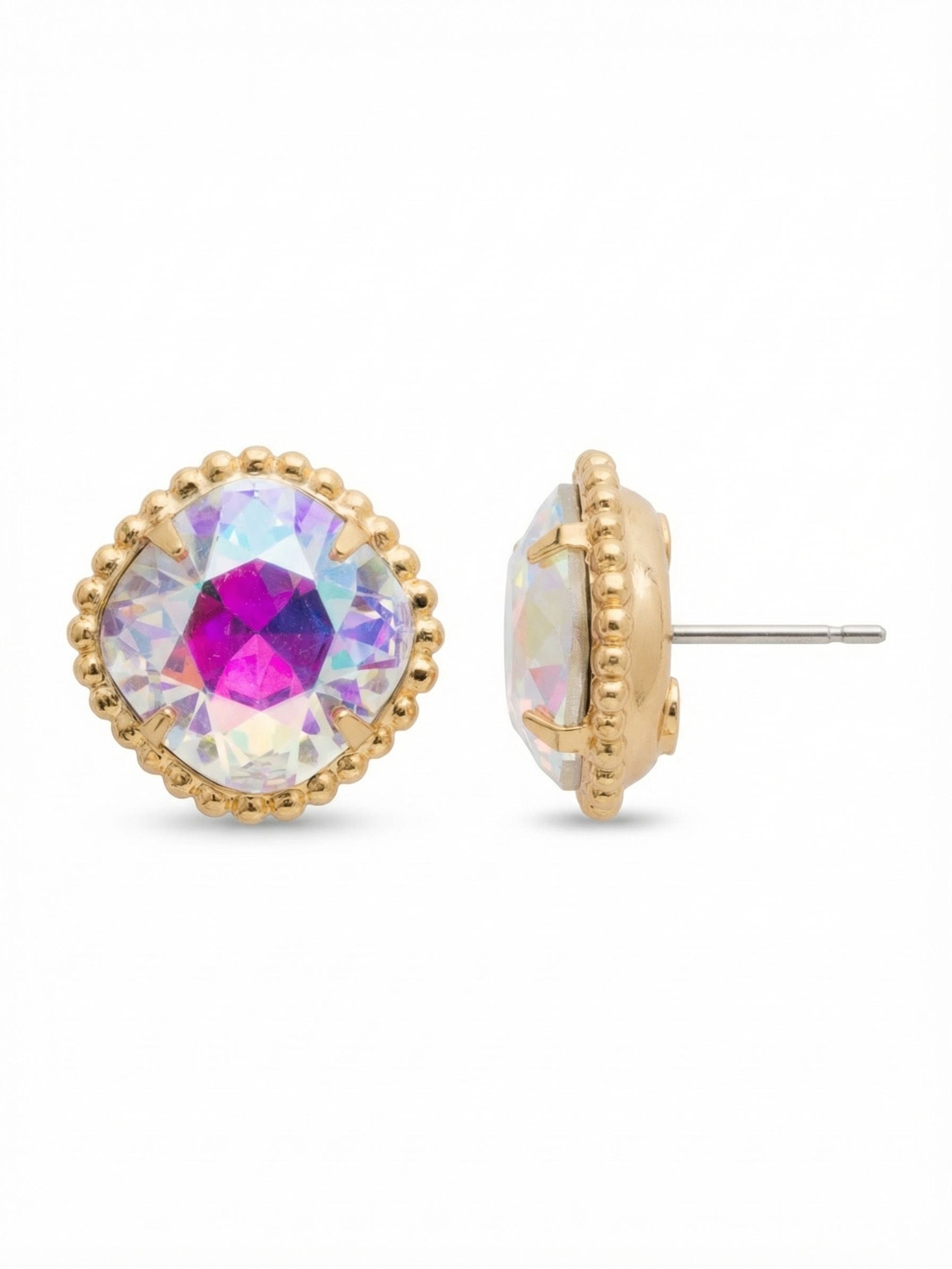 Cushion-Cut Solitaire Stud Earrings - EBX10BGCAB - <p>A substantial 12mm cushion-cut crystal acts as a singular focal point, throwing prismatic flashes of pink and blue. The bright gold-tone setting is detailed with a textured ball chain border framing the smooth stone. Measuring over half an inch across, these studs command attention at conversation distance. To keep the scale balanced, each post includes an oversized comfort clutch to ensure they remain completely flush and secure throughout the day.</p><ul>
<li>Substantial 12mm cushion-cut profile registers clearly at a distance</li>
<li>Textured ball chain border adds contrast to the smooth crystal</li>
<li>Post with oversized comfort-clutch back</li>
<li>Protective e-coat finish for lasting wear</li>
<li>Includes signature organza pouch for gifting and travel</li>
</ul>