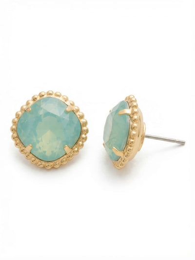 Cushion-Cut Solitaire Stud Earrings - EBX10BGPAC - <p>A substantial 12mm cushion-cut Pacific Opal crystal reads distinctly at conversation distance. The soft green faceting catches the light with quiet presence, framed by a delicate ball chain border that adds subtle architectural texture. Though significant in scale at over half an inch across, an oversized comfort clutch anchors the post securely. This tailored backing ensures the weight remains perfectly balanced and effortlessly wearable all day.</p><ul>
<li>Substantial 12mm cushion-cut crystal offers distinct visibility</li>
<li>Delicate ball chain framing adds tailored architectural texture</li>
<li>Post with oversized comfort-clutch back</li>
<li>Protective e-coat finish for lasting wear</li>
<li>Includes signature organza pouch for gifting and travel</li>
</ul>