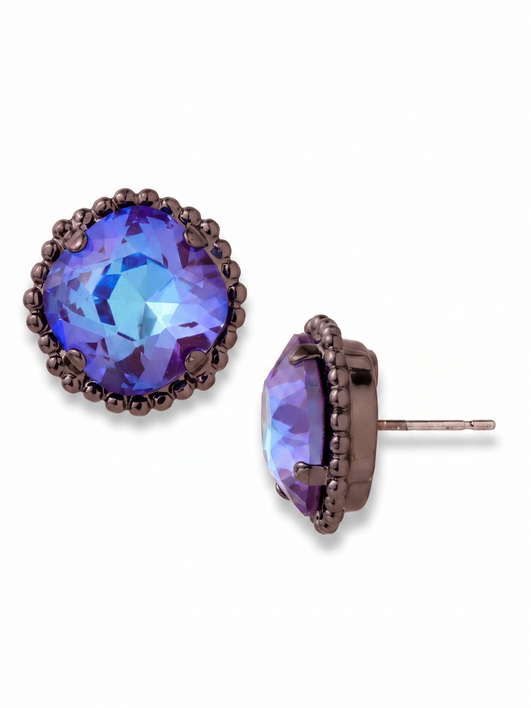 Cushion-Cut Solitaire Stud Earrings - EBX10GMBUD - <p>A substantial cushion-cut crystal anchors this stud earring, shifting through deep iridescent tones as you move. A textural ball chain border frames the faceted center, adding a subtle architectural detail to the dark metal setting. Because a piece with this much visual presence needs proper support, it relies on an oversized comfort clutch to keep the earring balanced and secure all day. It reads clearly from across a room while revealing intricate metalwork up close.</p><ul>
<li>Textural ball chain halo provides an architectural contrast to the faceted center</li>
<li>Substantial cushion-cut profile delivers significant visual weight and presence</li>
<li>Post with oversized comfort-clutch back</li>
<li>Includes signature organza pouch for gifting and travel</li>
</ul>