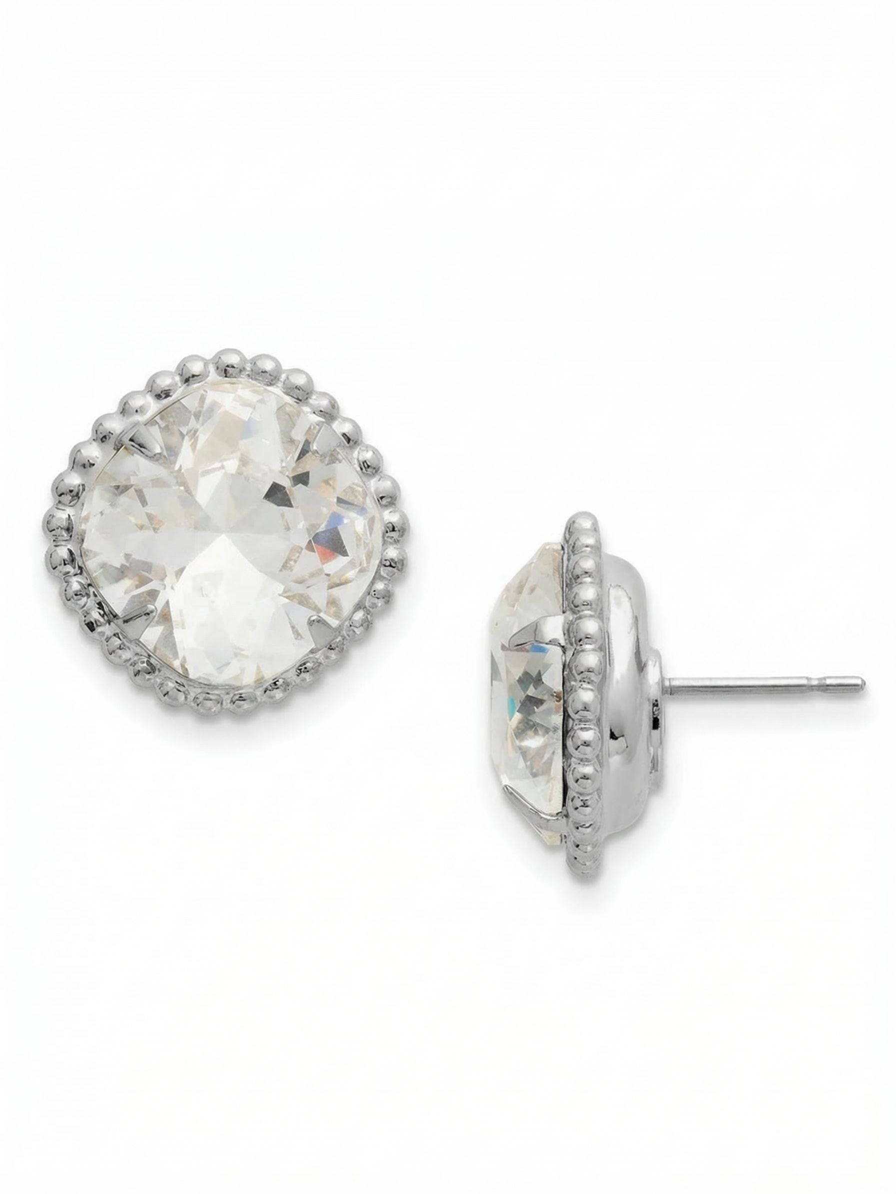 Cushion-Cut Solitaire Stud Earrings - EBX10PDCRY - <p>At over half an inch across, these clear cushion-cut crystals have real presence at conversation distance. The substantial stones are framed by a delicate metallic ball chain border, adding just enough texture to the clean lines of the setting. While they offer significant scale and light-catching depth, they stay perfectly anchored in place. The included oversized comfort clutch ensures these larger studs remain flush and secure from morning until evening.</p><ul>
<li>Faceted 12mm cushion-cut crystal center</li>
<li>Delicate ball chain detailing along the setting edge</li>
<li>Post with oversized comfort-clutch back</li>
<li>Protective e-coat finish for lasting wear</li>
<li>Includes signature organza pouch for gifting and travel</li>
</ul>