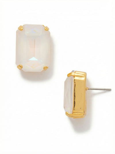 Brynn Stud Earrings - EBY44BGUWAB - <p>A single, substantial emerald-cut crystal anchors this stud, reading as a clean block of iridescent light at conversation distance. Up close, the step-cut facets of the milky stone catch subtle flashes of color framed by heavy gold-tone prongs. Because a stone this size requires true balance, it includes an oversized comfort clutch that holds the weight securely flush against your ear all day. It brings quiet, structured geometry to an oversized button-down or a bare neckline.</p><ul>
<li>Clean step-cut faceting across a single large rectangular stone</li>
<li>Opaque iridescent finish creates subtle color shifts in changing light</li>
<li>Post with oversized comfort-clutch back</li>
<li>Protective e-coat finish for lasting wear</li>
<li>Includes signature organza pouch for gifting and travel</li>
</ul>