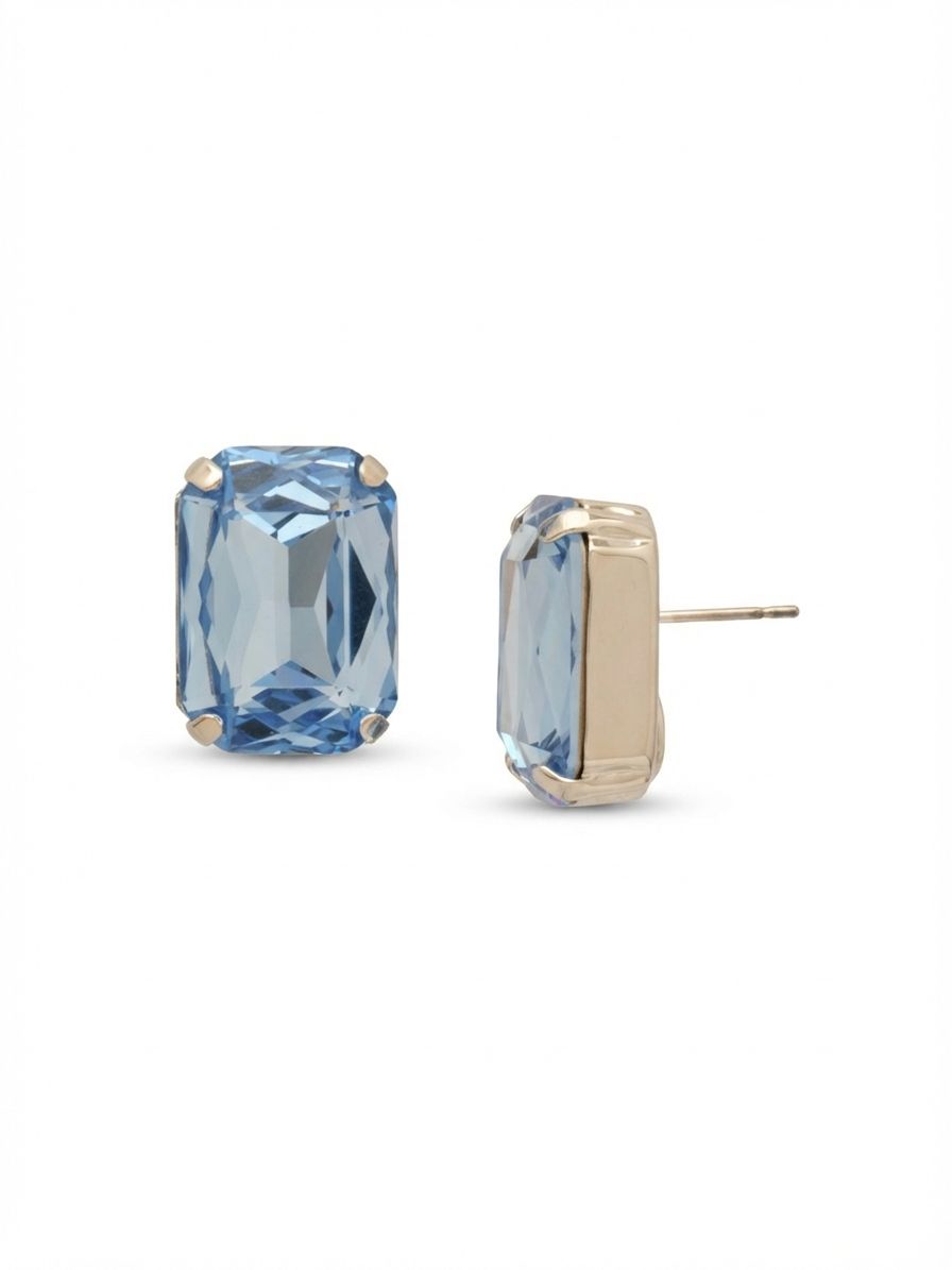 Brynn Stud Earrings - EBY44PDLTS - <p>A single, substantial emerald-cut crystal defines this oversized stud earring. The pale blue stone catches light in broad, clean flashes rather than a scattered sparkle, giving it a modern clarity. Because of its generous three-quarter-inch scale, it brings significant presence to your face even from across a room. An oversized comfort clutch back comes standard, ensuring the weight remains balanced and secure all day without tilting forward. It brings a grounded hit of icy color to an otherwise neutral daily uniform.</p><ul>
<li>Oversized step-cut crystal creates broad flashes of light</li>
<li>Substantial geometric profile reads clearly from across the room</li>
<li>Post with oversized comfort-clutch back</li>
<li>Protective e-coat finish for lasting wear</li>
<li>Includes signature organza pouch for gifting and travel</li>
</ul>