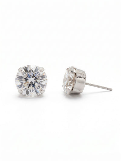 London Stud Earrings - ECM14PDCRY - <p>A definitive take on the classic solitaire. At half an inch wide, these round-cut clear crystals deliver substantial presence that registers clearly from across the room. Despite their generous scale, the stones sit securely and comfortably against the ear, held in perfect position all day by an oversized comfort clutch back.</p><ul>
<li>Substantial solitaire scale that reads clearly at a distance</li>
<li>Classic four-prong setting maximizes light through the clear crystal</li>
<li>Post with oversized comfort-clutch back</li>
<li>Protective e-coat finish for lasting wear</li>
<li>Includes signature organza pouch for gifting and travel</li>
</ul>
