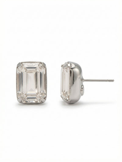 Everyday Stud Earrings - ECT11PDCRY - <p>A solitary emerald-cut crystal provides a clear anchor of light near the face. The precise step cuts and deep palladium setting give this stud a structured, architectural presence that registers easily from across a room. Since a piece this substantial requires proper support, an oversized comfort clutch keeps the weight balanced and secure so it remains perfectly positioned from morning until night.</p><ul>
<li>Substantial emerald-cut crystals offer a strong geometric presence</li>
<li>Deep architectural setting emphasizes the clean lines of the step cut</li>
<li>Post with oversized comfort-clutch back</li>
<li>Protective e-coat finish for lasting wear</li>
<li>Includes signature organza pouch for gifting and travel</li>
</ul>