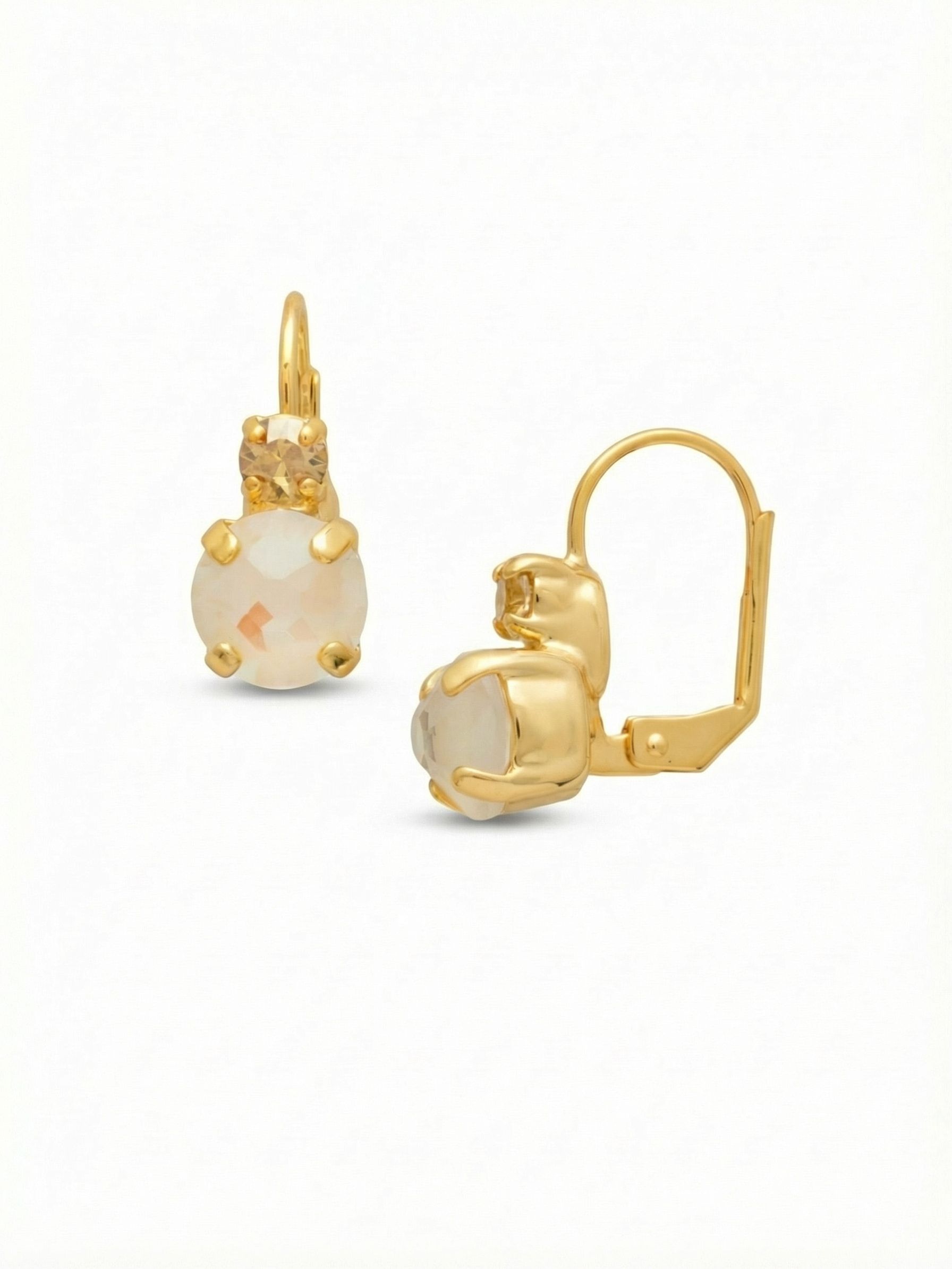 Round Crystal Dangle Earrings - ECW36BGGGO - <p>A quiet study in warmth and light. These subtle drops pair the soft champagne glow of a golden shadow crystal with the milky iridescence of a larger aurora borealis stone. At just under an inch, the scale is intentional, offering a comfortable presence that transitions effortlessly through your day. The secure earwire closure ensures they stay exactly where you placed them, allowing the bright gold-tone setting and faceted round cuts to catch the sun with every turn of your head.</p><ul>
<li>Two-tiered crystal design creates a subtle play of warm and iridescent light</li>
<li>Faceted golden shadow stone rests flush above a milky aurora borealis crystal</li>
<li>French wire for a smooth, secure fit</li>
<li>Protective e-coat finish for lasting wear</li>
<li>Includes signature organza pouch for gifting and travel</li>
</ul>