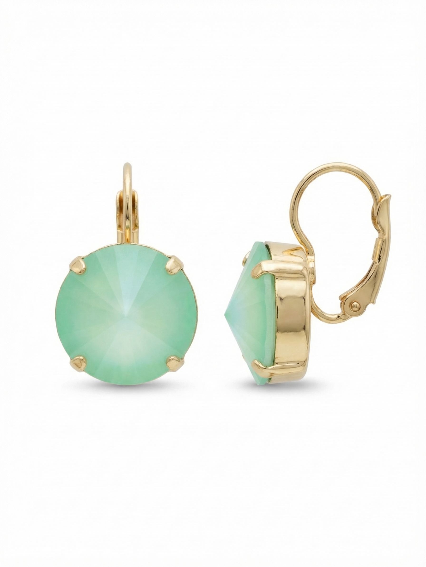Nadine Dangle Earrings - EDH108BGMND - <p>A single, substantial round crystal anchors this minimalist drop earring. The milky mint green stone catches the light as it sways slightly just below the ear. Set in bright metal prongs, the pared-back design leaves the focus entirely on the soft wash of color. The hinged closure provides a secure, comfortable fit that lasts all day, making this an easy choice when your outfit needs a quiet focal point without heavy layering.</p><ul>
<li>Substantial round crystal provides a concentrated pop of pastel color</li>
<li>Minimalist prong setting maximizes the visibility of the single stone</li>
<li>Hook drop for easy, lightweight wear</li>
<li>Protective e-coat finish for lasting wear</li>
<li>Includes signature organza pouch for gifting and travel</li>
</ul>