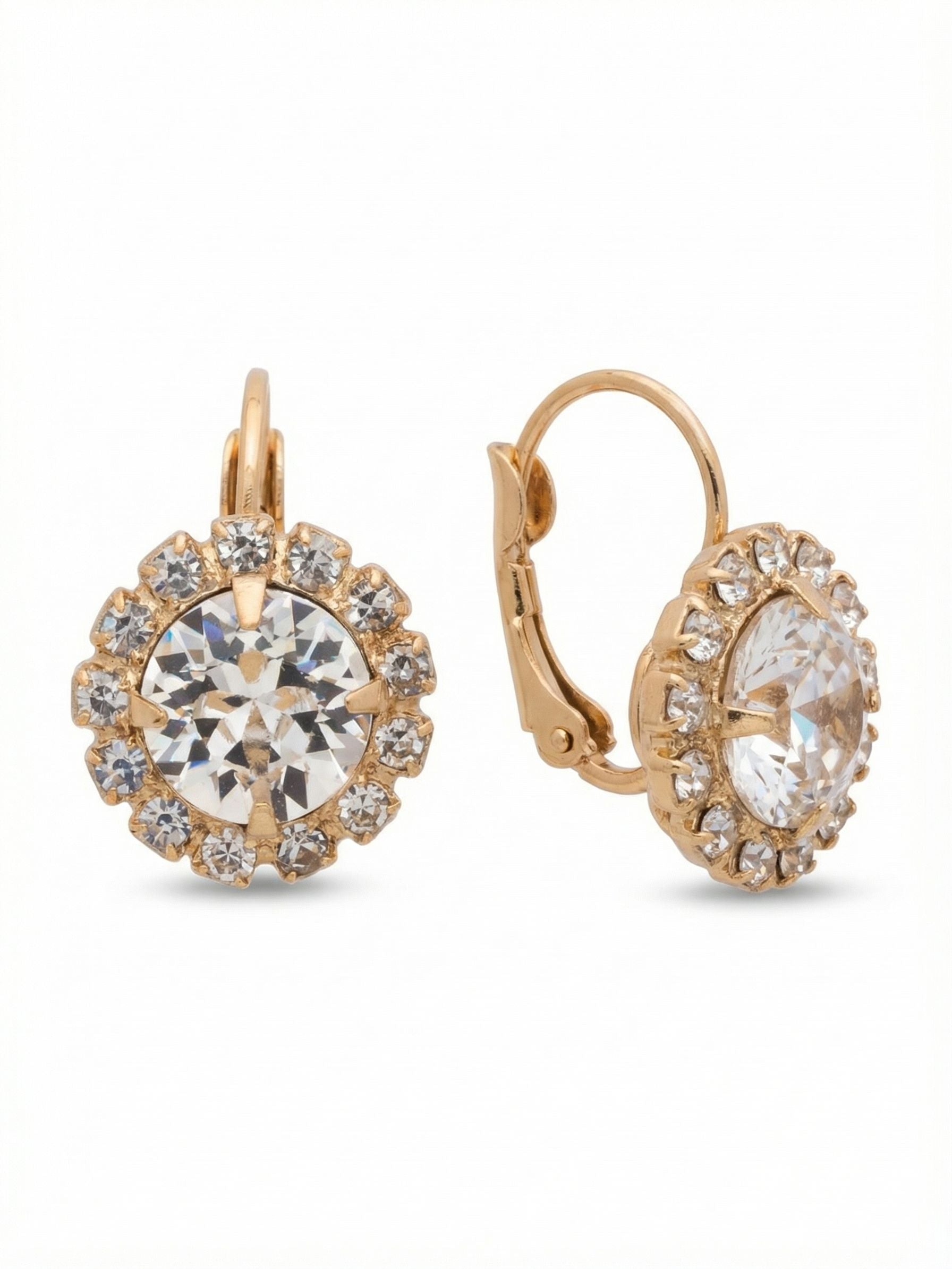 Haute Halo Dangle Earrings - EDL10BGCRY - <p>A central round crystal sits cleanly within a continuous ring of smaller stones to catch and reflect light. This short drop design stays close to the face, providing a subtle, controlled swing as you move through your day. The secure wire closure keeps the piece comfortably anchored, while the bright metal setting adds quiet warmth. It is a familiar, versatile silhouette that easily becomes a staple in your daily rotation.</p><ul>
<li>Prominent round center stone framed by a delicate crystal halo</li>
<li>Compact drop silhouette that offers a subtle swing</li>
<li>Hook drop for easy, lightweight wear</li>
<li>Protective e-coat finish for lasting wear</li>
<li>Includes signature organza pouch for gifting and travel</li>
</ul>