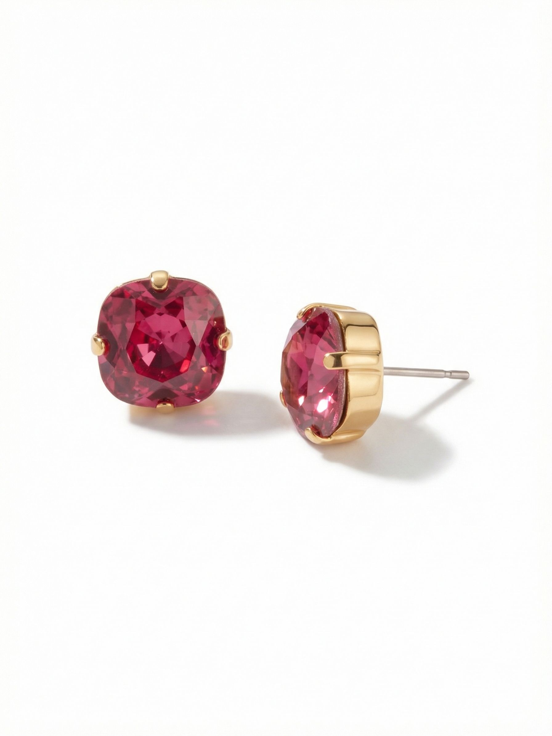 Aisha Stud Earrings - EDN16BGRO - <p>At half an inch across, these cushion cut studs bring immediate warmth and significant presence to your face. The deep rose crystal catches the light beautifully, framed securely by four distinct prongs in a bright gold tone setting. Because a larger stud requires proper balance, we include an oversized comfort clutch to hold the stone squarely in place all day. It is an effortless way to wear rich color, easily transitioning from morning routines to evening plans.</p><ul>
<li>Substantial half inch cushion cut crystal profile</li>
<li>Exposed four prong setting emphasizes the square cut</li>
<li>Post with oversized comfort-clutch back</li>
<li>Protective e-coat finish for lasting wear</li>
<li>Includes signature organza pouch for gifting and travel</li>
</ul>