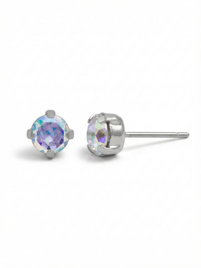 Jayda Stud Earrings - EDN32PDCAB - <p>A solitary round crystal catches the light with shifting iridescent color. Measuring just a quarter inch across, this classic four-prong setting brings a subtle but vivid detail to your daily routine. The cool tone of the setting frames the faceted stones cleanly. An oversized comfort clutch backing ensures a secure, balanced fit from morning until night.</p><ul>
<li>Classic solitary round crystal silhouette</li>
<li>Iridescent facets shift between warm and cool tones in the light</li>
<li>Post with oversized comfort-clutch back</li>
<li>Protective e-coat finish for lasting wear</li>
<li>Includes signature organza pouch for gifting and travel</li>
</ul>