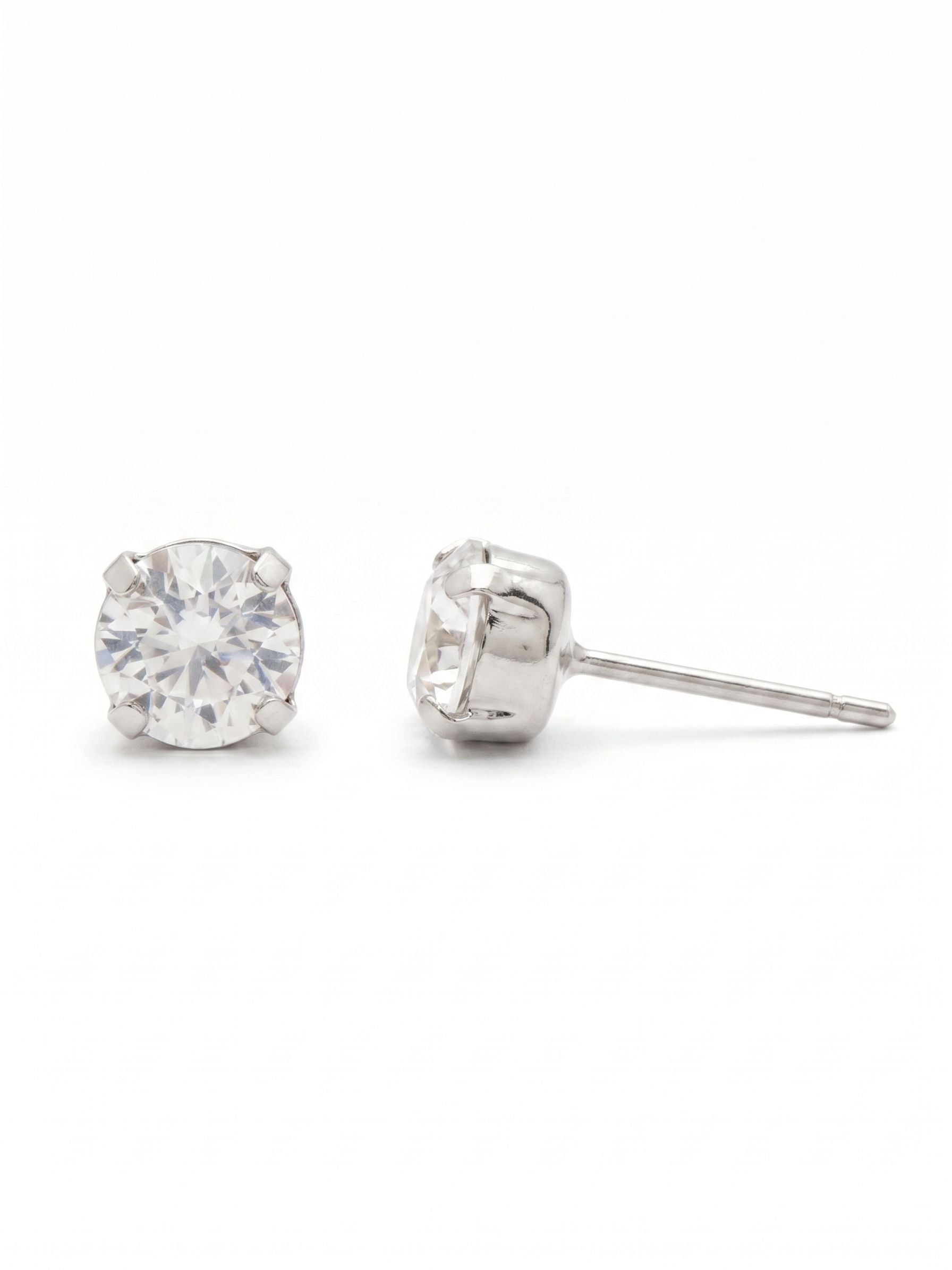 Jayda Stud Earrings - EDN32PDCRY - <p>A single, beautifully faceted round crystal makes a quiet point of light for everyday wear. The quarter-inch scale gives this stud a subtle presence that transitions easily from morning errands to evening plans. An oversized comfort clutch ensures the setting stays secure and perfectly positioned from the moment you put it on.</p><ul>
<li>Classic four-prong setting maximizes light reflection through the stone</li>
<li>Minimalist solitaire profile designed for versatile daily wear</li>
<li>Post with oversized comfort-clutch back</li>
<li>Protective e-coat finish for lasting wear</li>
<li>Includes signature organza pouch for gifting and travel</li>
</ul>