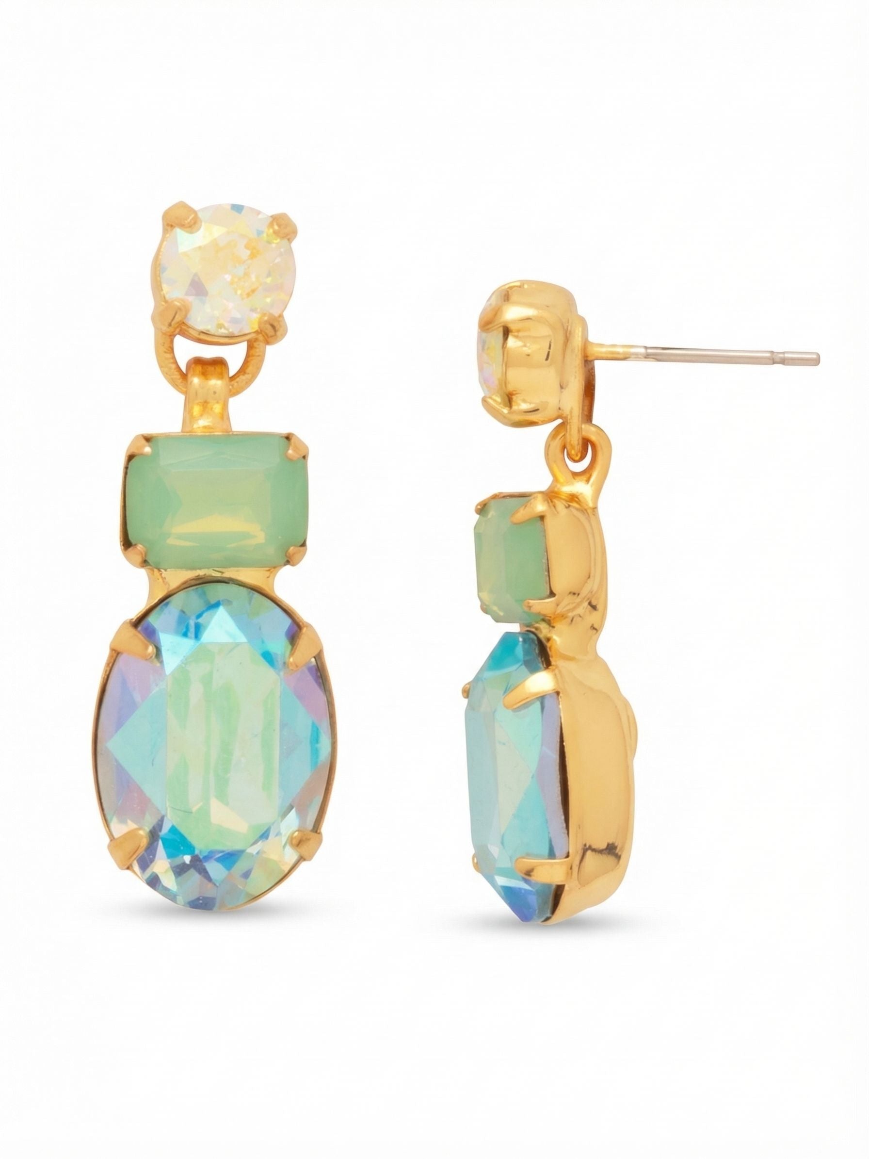 Forget-Me-Not Dangle Earring - EDQ6BGCSD - <p>A three-tier drop built for deliberate movement. A round aurora borealis crystal anchors the post, leading to a flexible joint that lets the milky Pacific Opal and faceted oval Aquamarine stones sway freely. The articulated ladder chain construction means these cool, shifting blues and greens catch the light every time you turn your head. At just over an inch long, they deliver substantial presence without dragging, kept comfortably secure all day by an oversized pressure-fit backing.</p><ul>
<li>Mixed round, emerald, and oval cuts arranged in a fluid linear stack</li>
<li>Articulated center hinge creates deliberate movement with every turn</li>
<li>Post with oversized comfort-clutch back</li>
<li>Protective e-coat finish for lasting wear</li>
<li>Includes signature organza pouch for gifting and travel</li>
</ul>